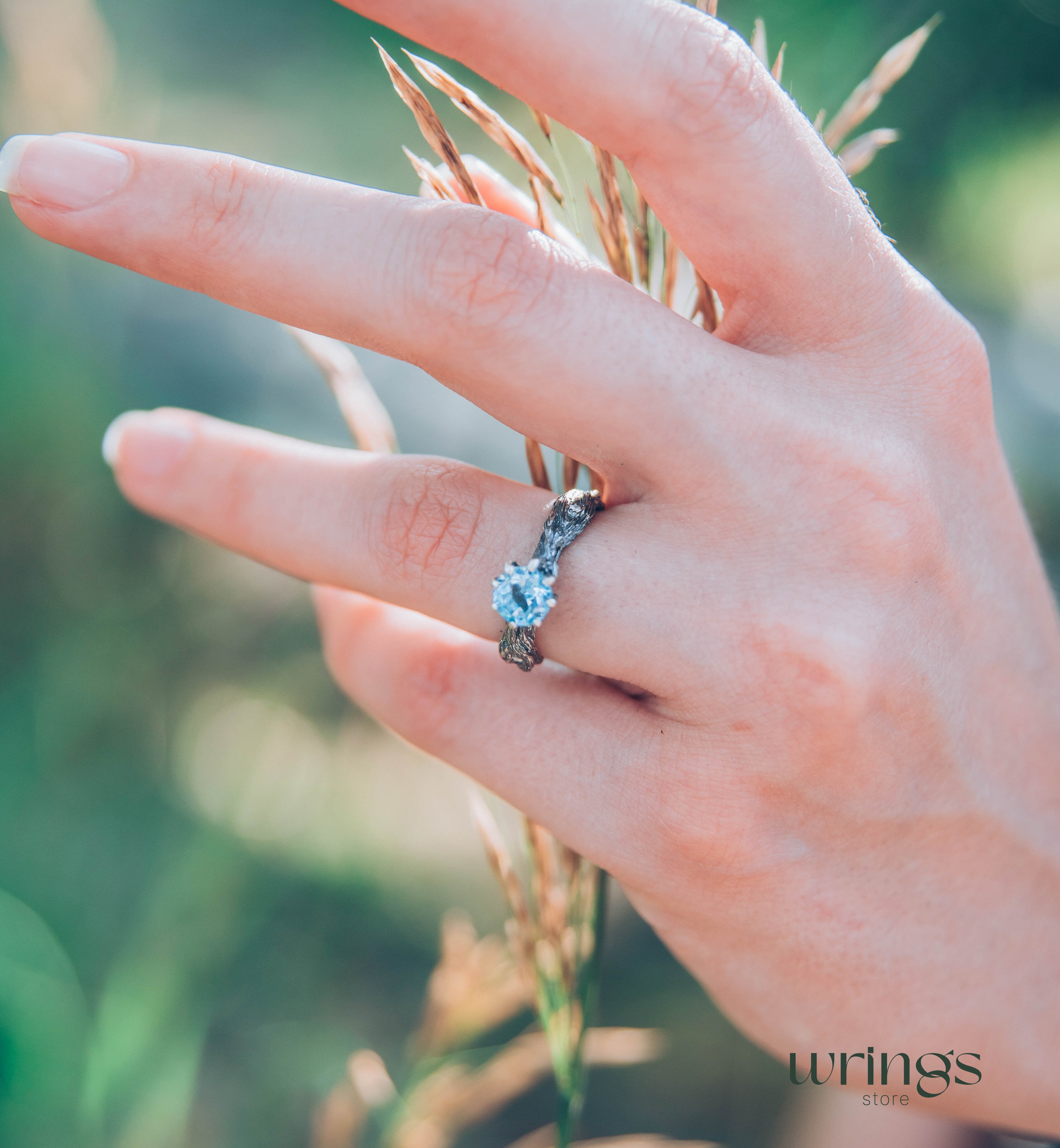 Vivid Topaz Engagement Ring with Silver Branch