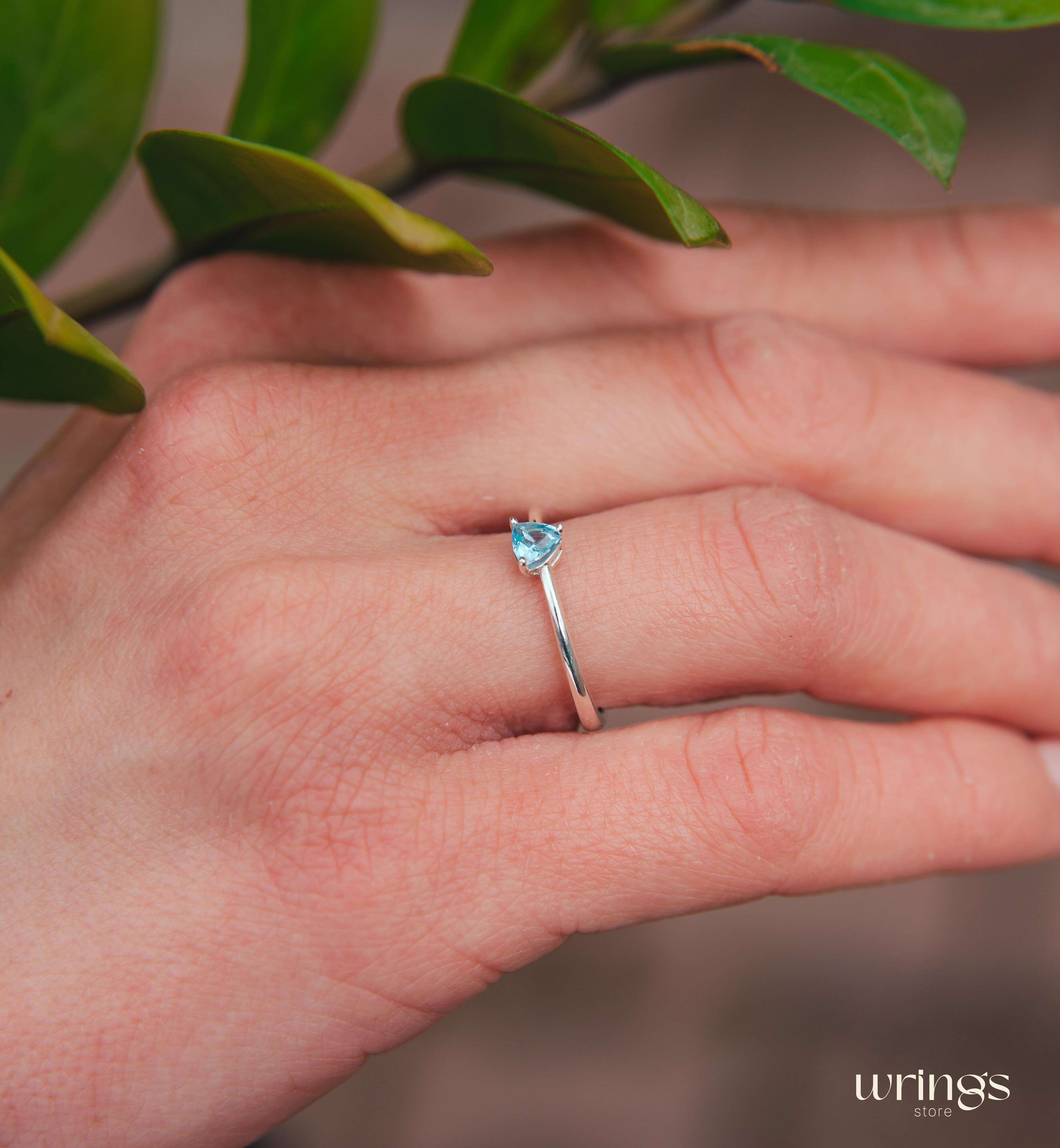 Blue Swiss Topaz Trillion Solitaire Ring in Silver