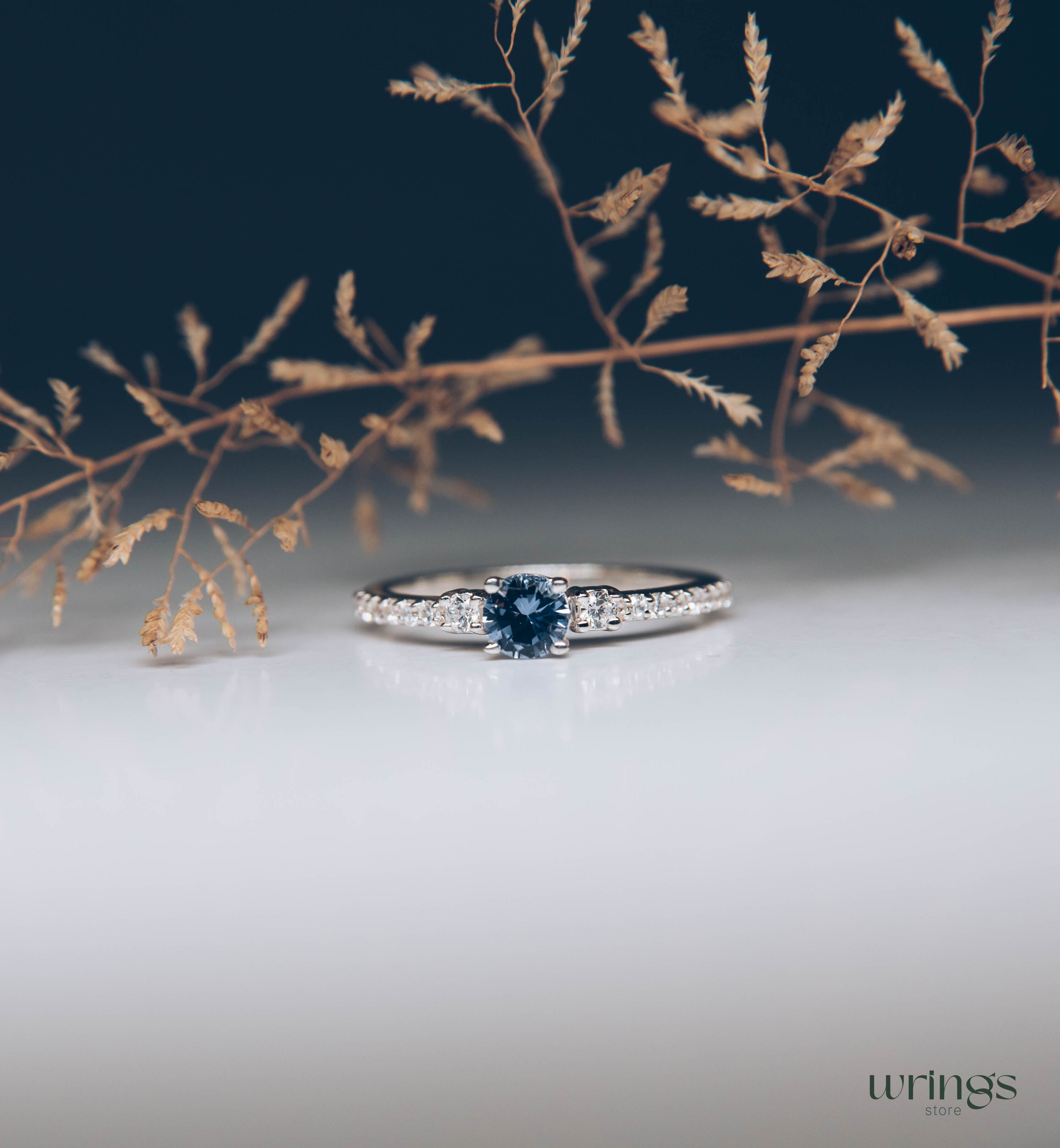 Tanzanite & CZ Side Stones Silver Engagement Ring