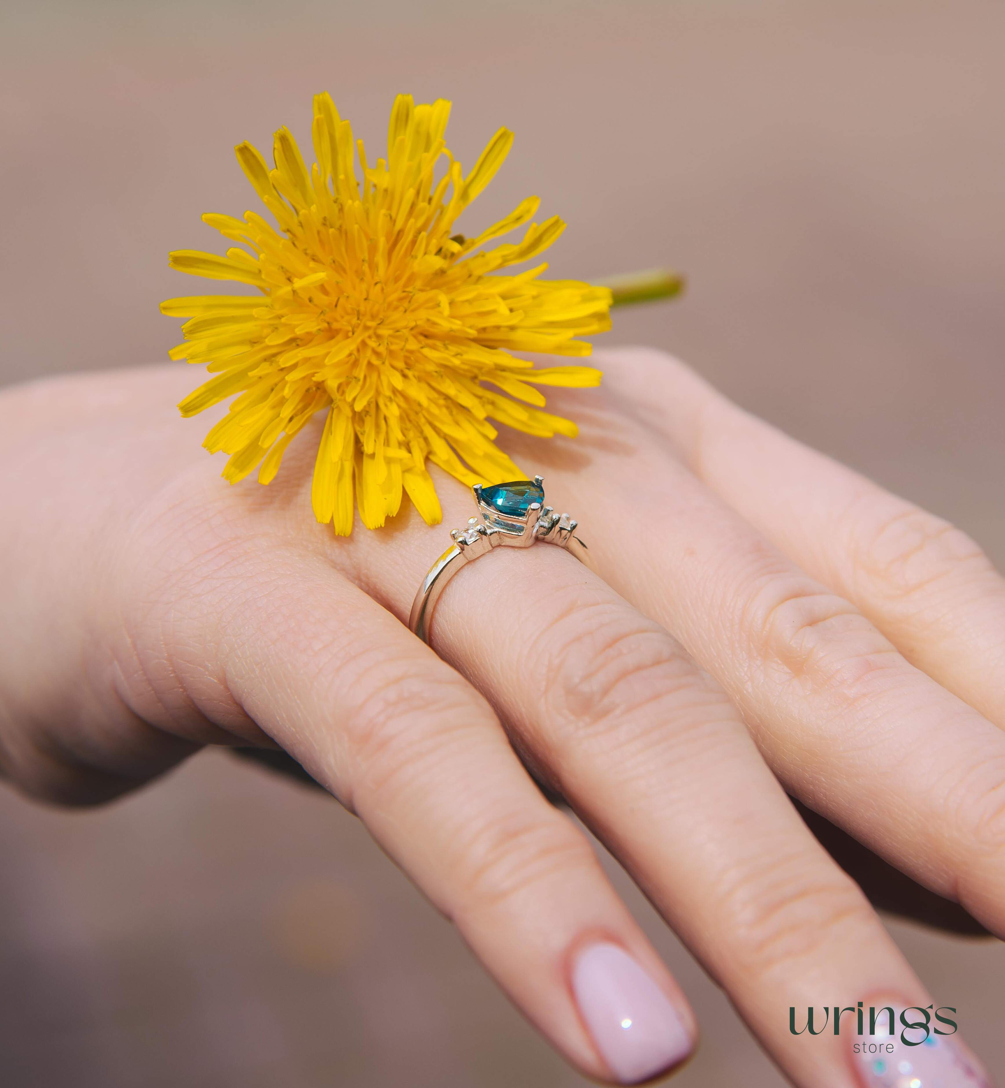 Large Trillion Blue Topaz Three Stone Engagement Ring