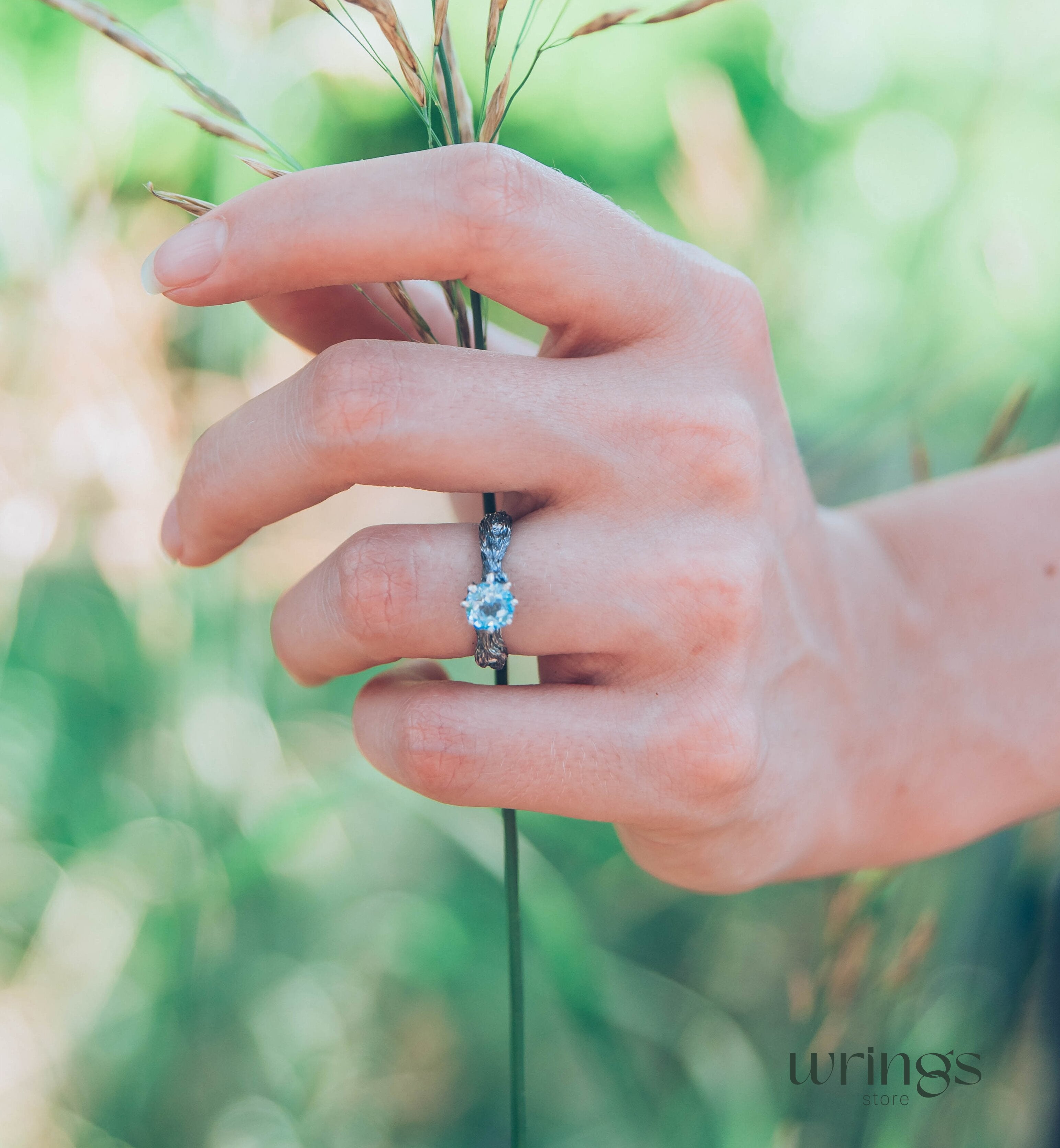 Vivid Topaz Engagement Ring with Silver Branch