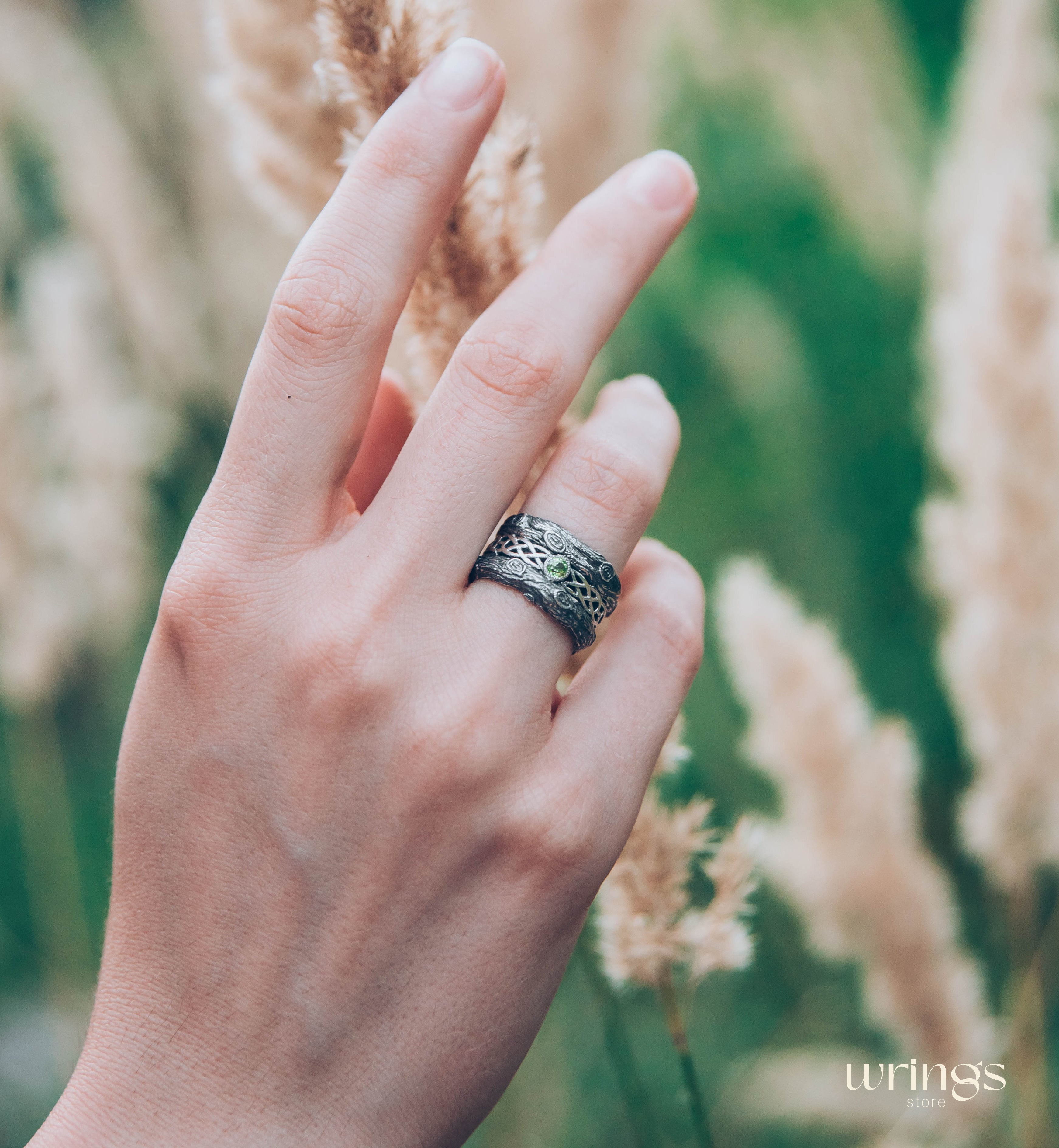 Silver bark with Celtic Weaves & Peridot Wedding Ring