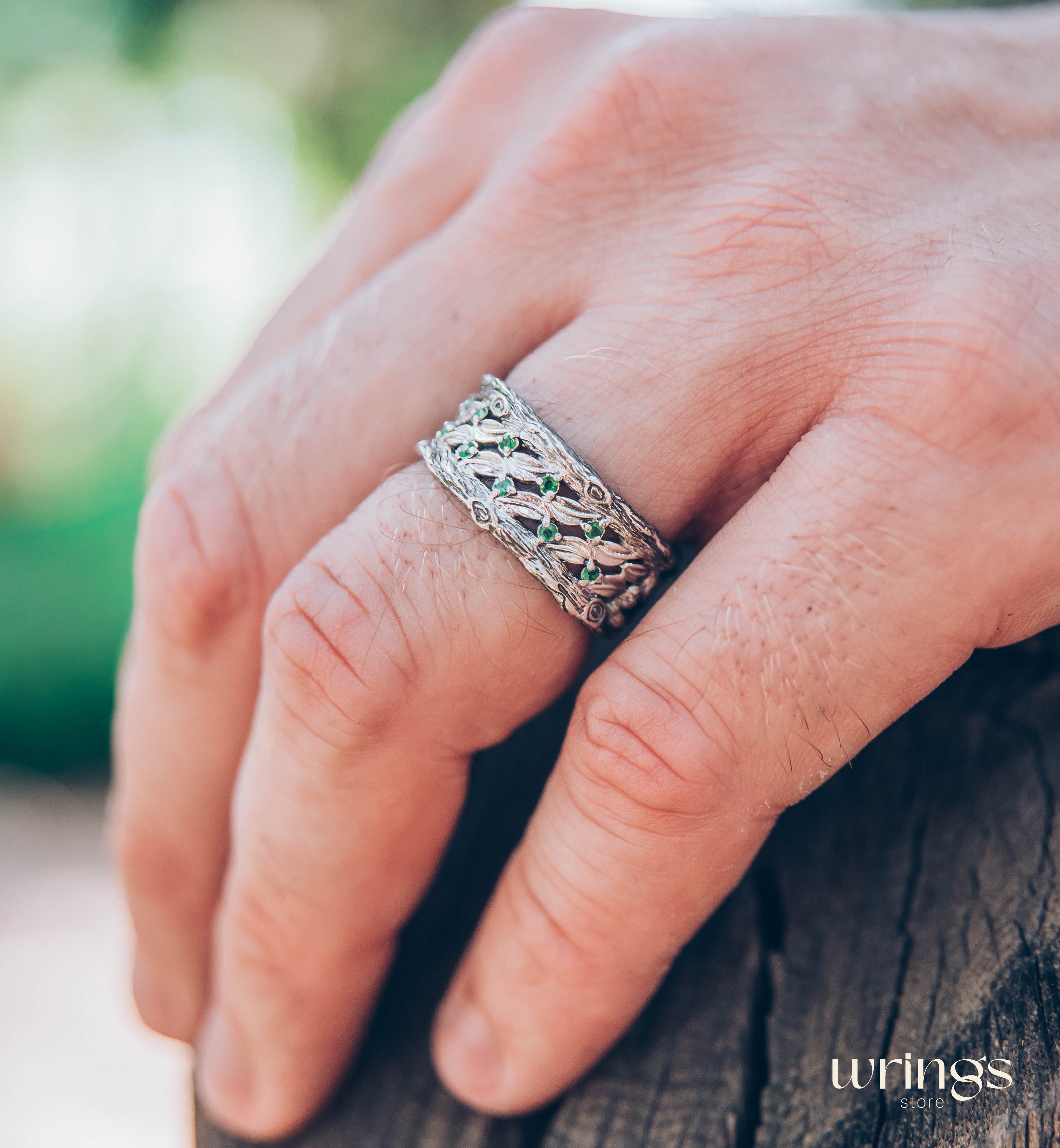 Silver Leaves and Branch Statement Wedding Band with Emeralds
