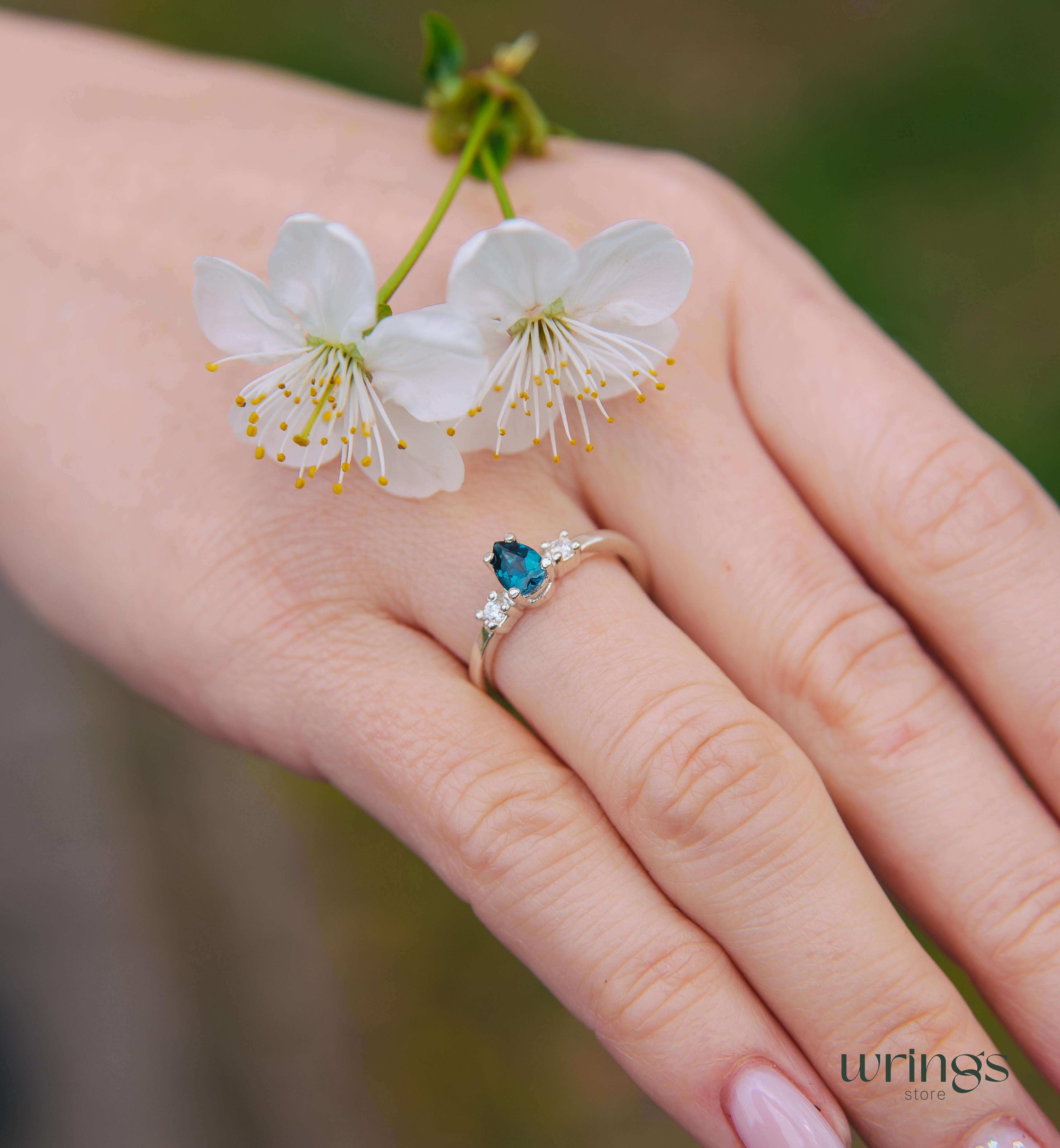 Central Pear London Blue Topaz 3 Stone Engagement Ring