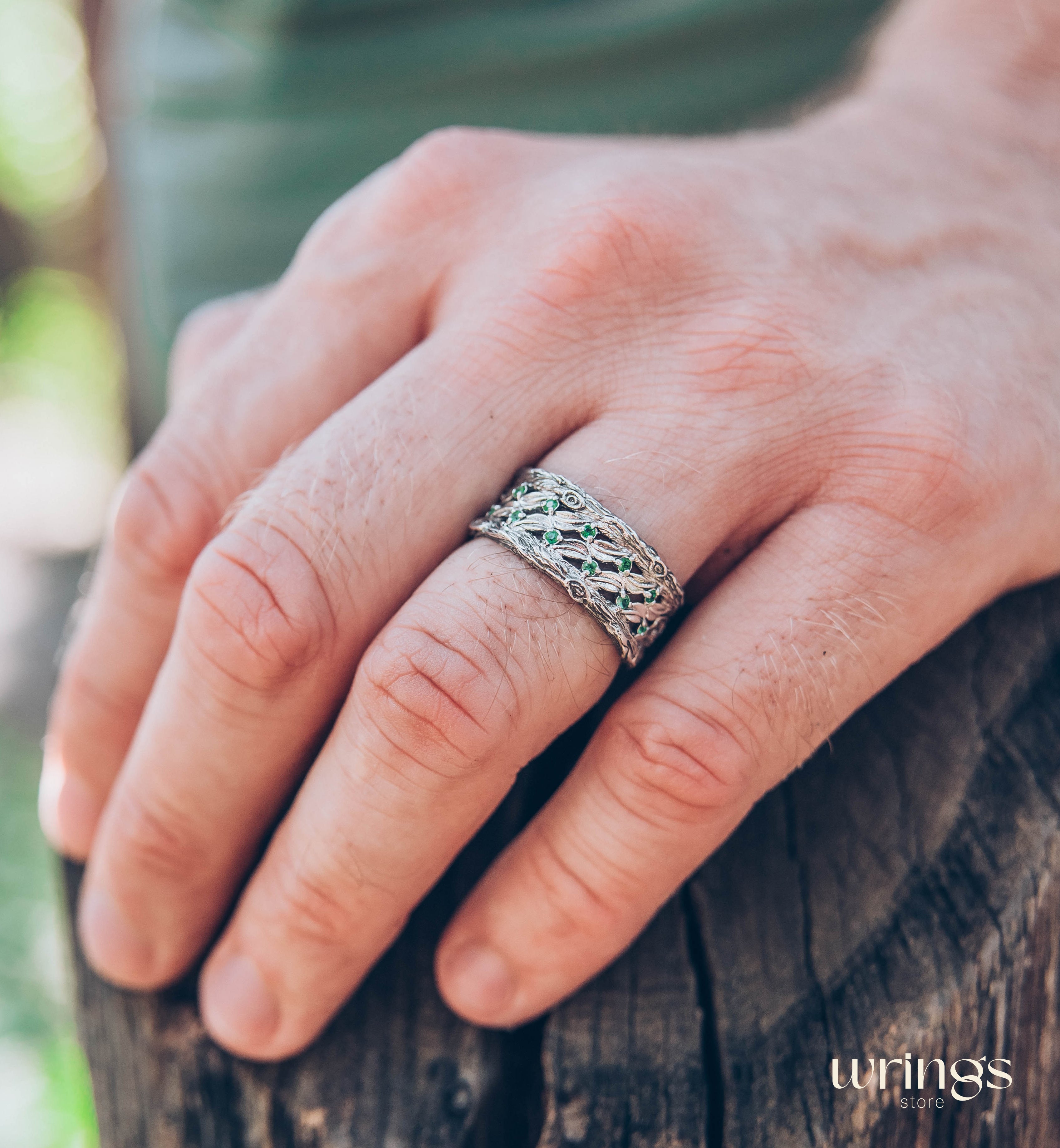 Silver Leaves and Branch Statement Wedding Band with Emeralds