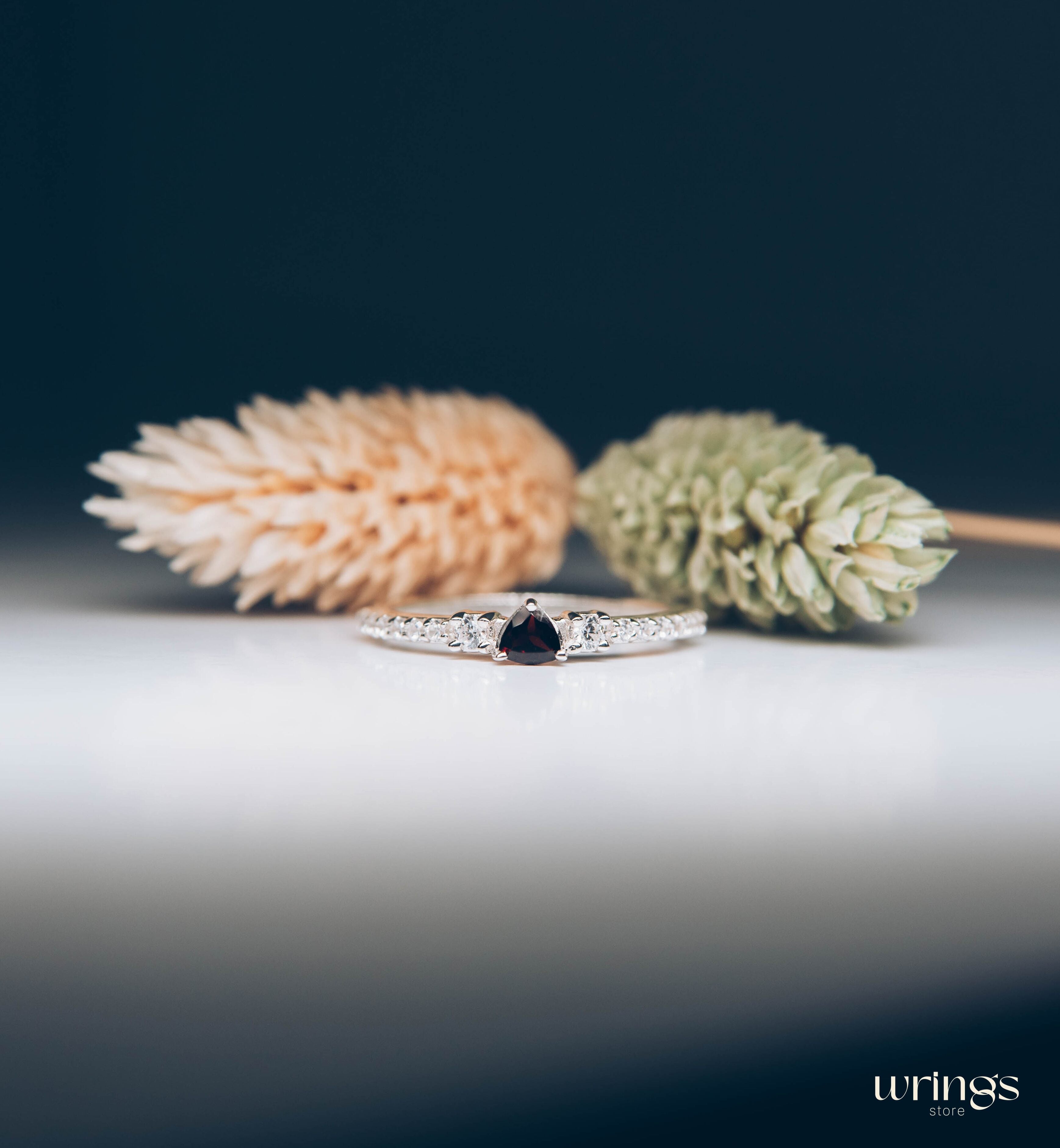 3 Stone Garnet Ring - Triillion central Gem & Side Zirconia