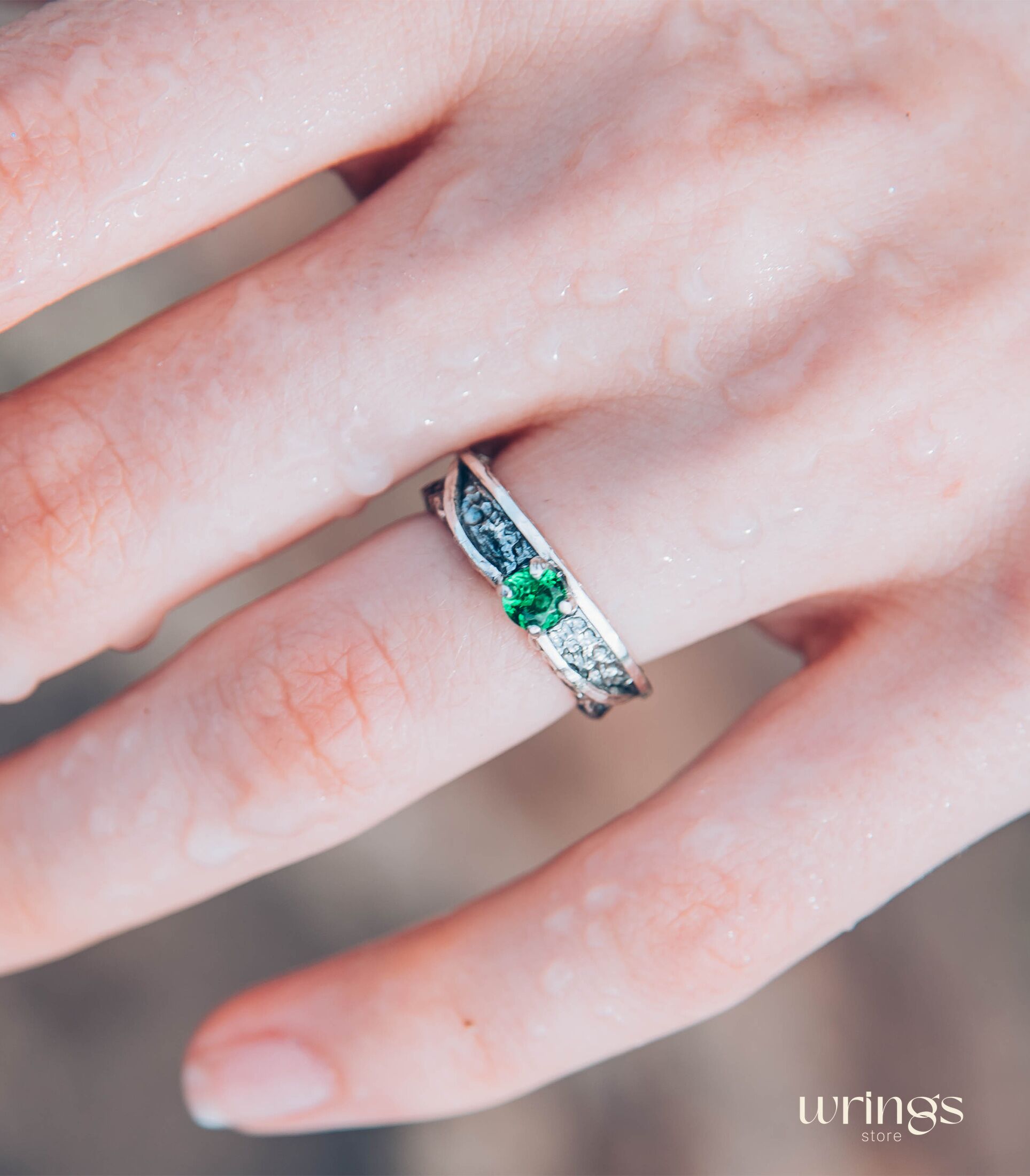 Avant garde Silver Hammered Engagement Ring with Emerald