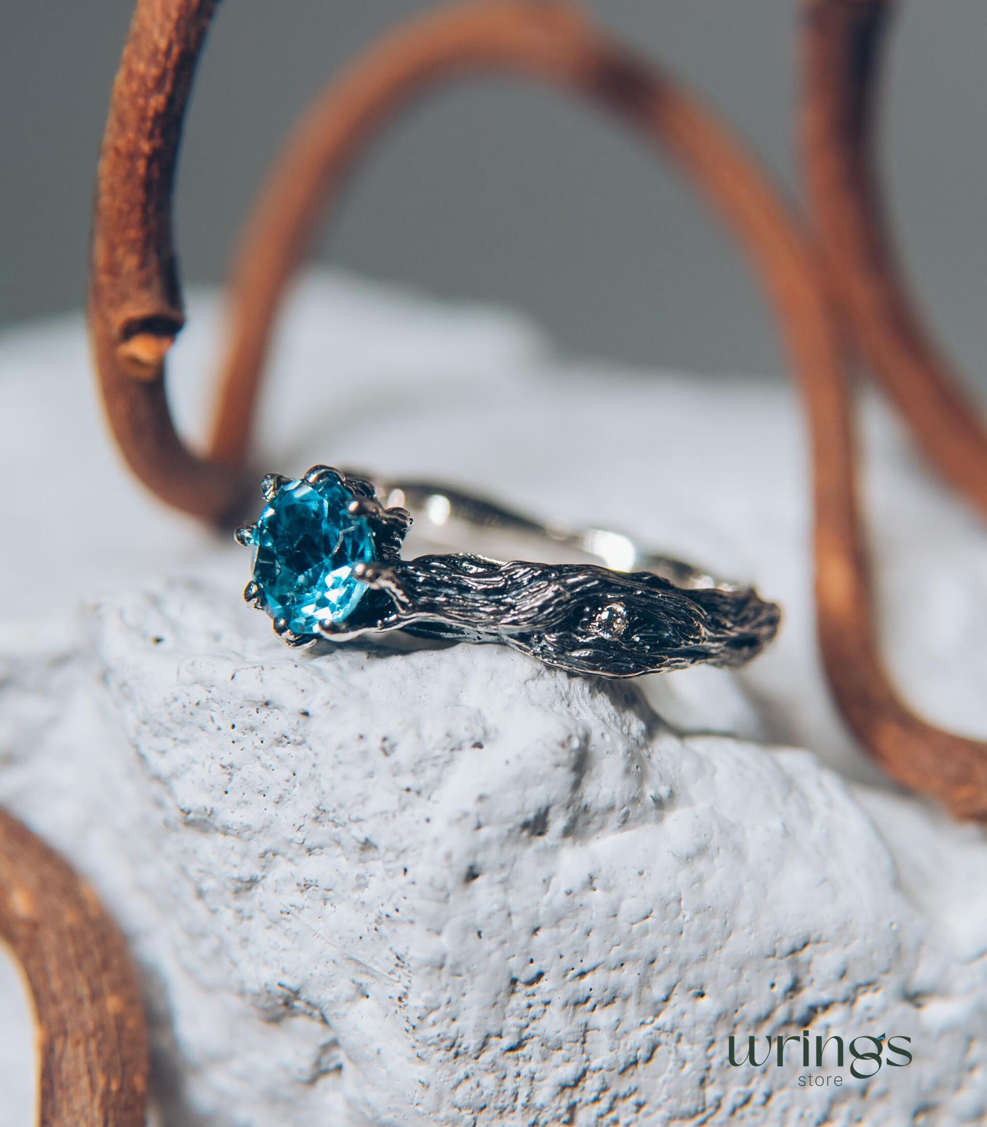 Vivid Topaz Engagement Ring with Silver Branch