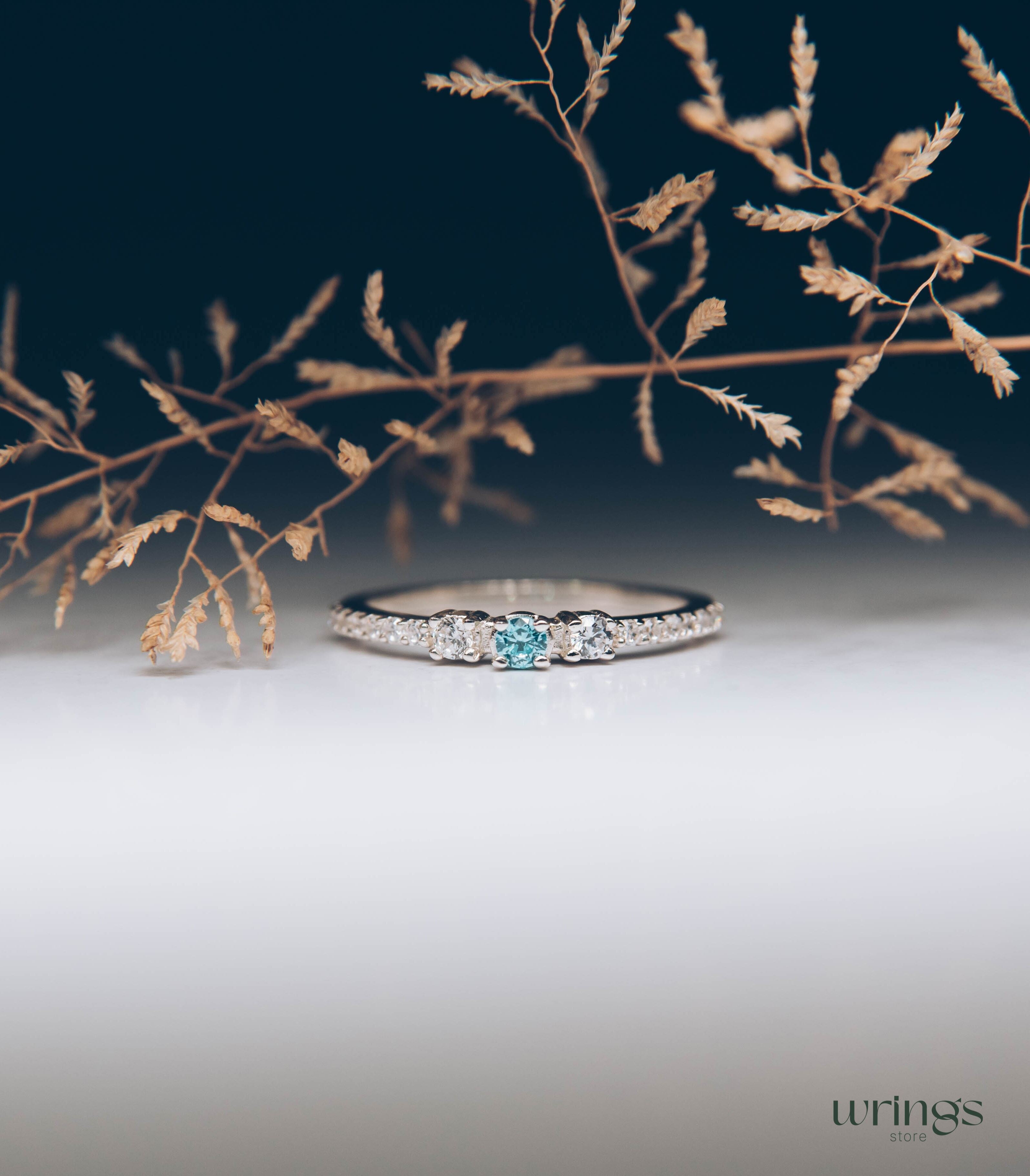 Central Swiss Topaz Silver Multi Stone Engagement Ring