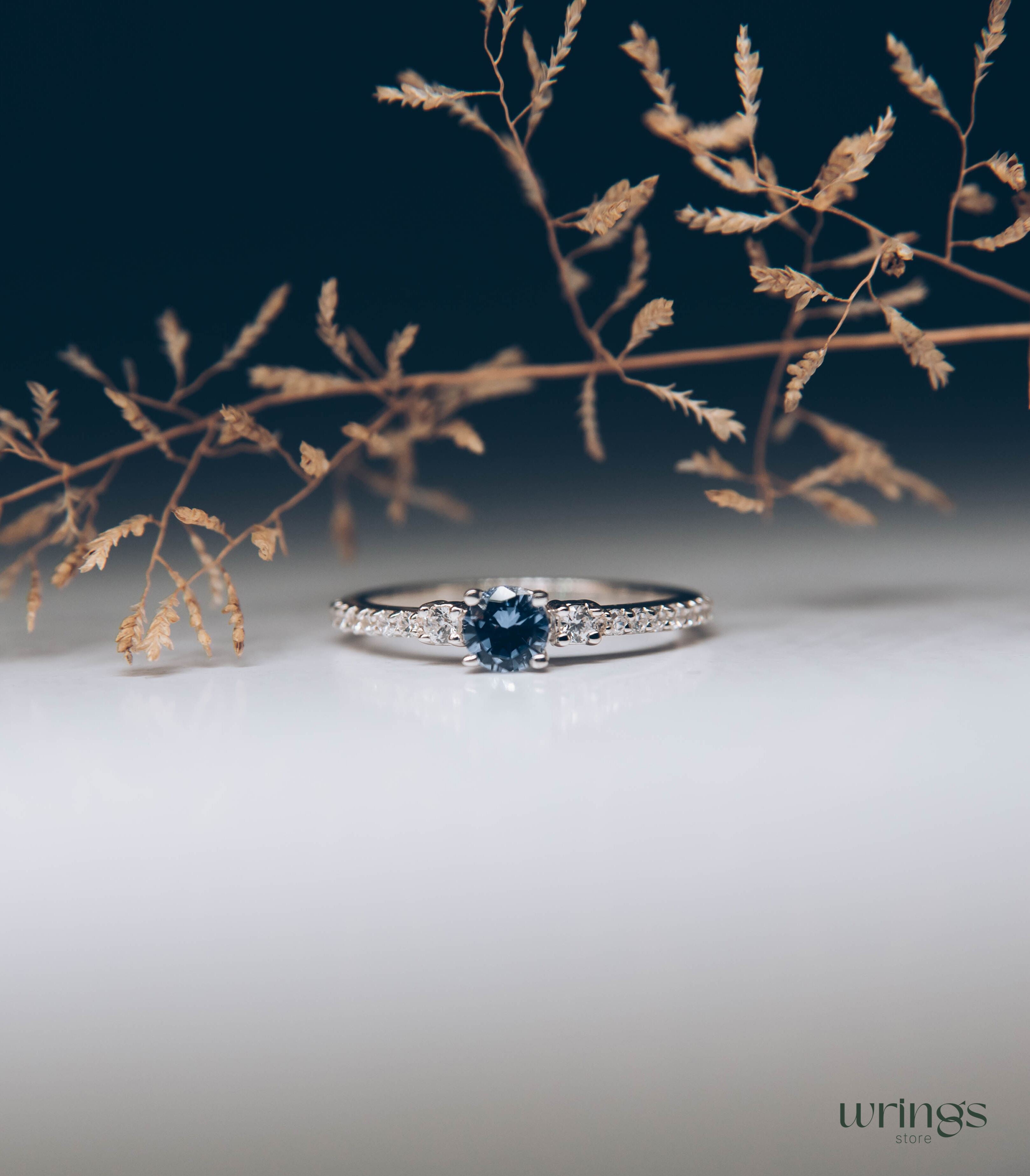 Tanzanite & CZ Side Stones Silver Engagement Ring