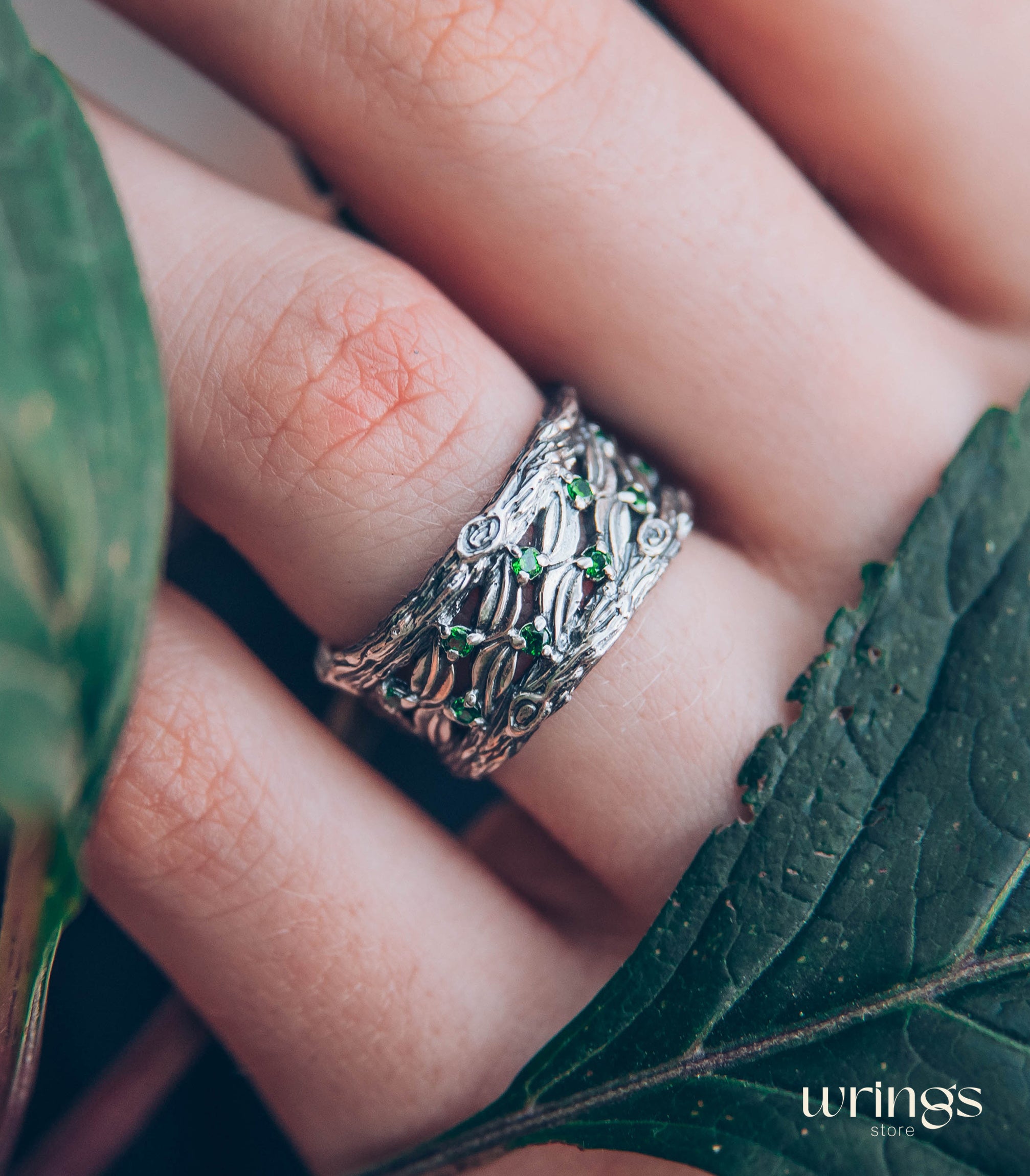 Silver Leaves and Branch Statement Wedding Band with Emeralds