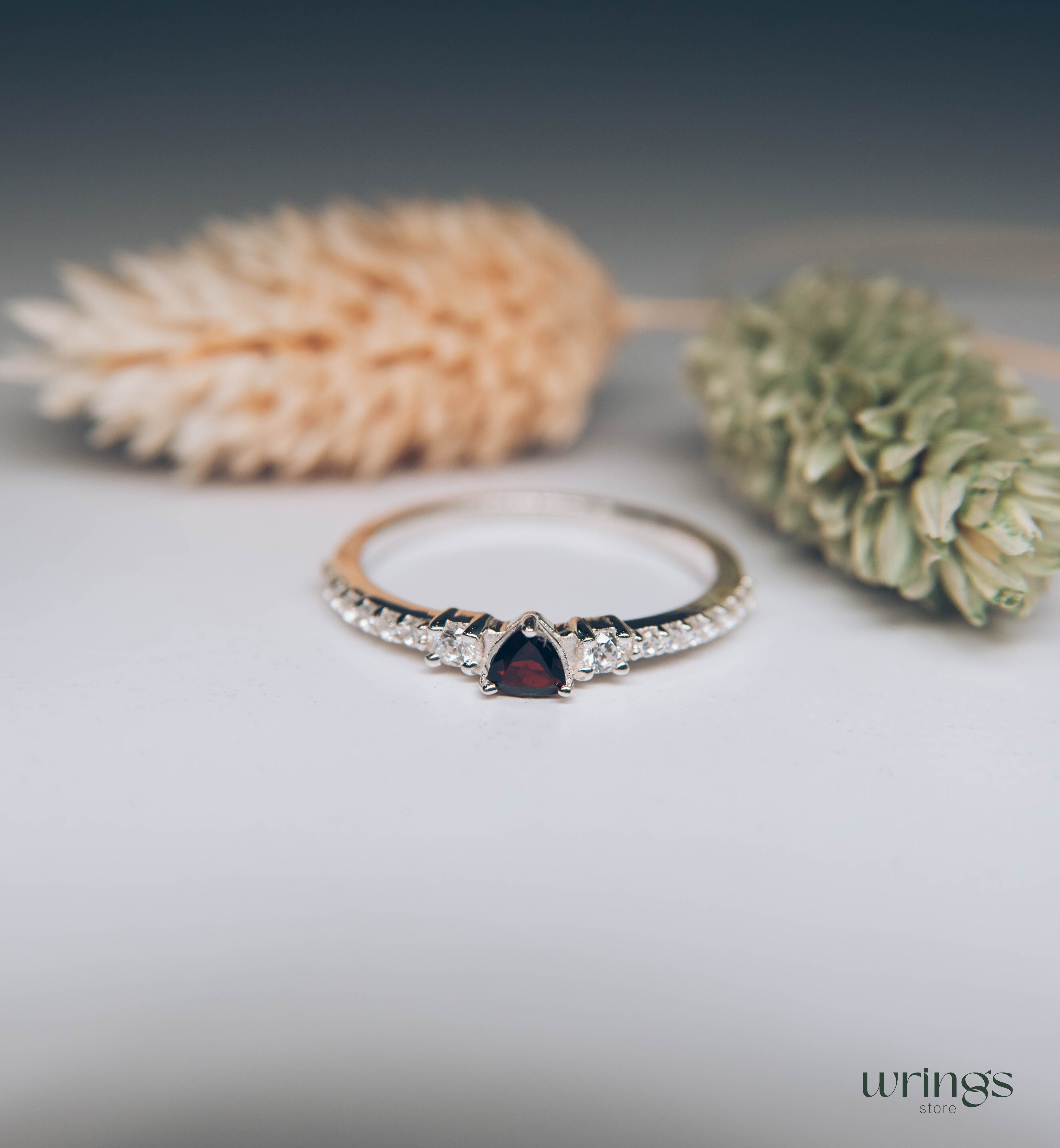 3 Stone Garnet Ring - Triillion central Gem & Side Zirconia