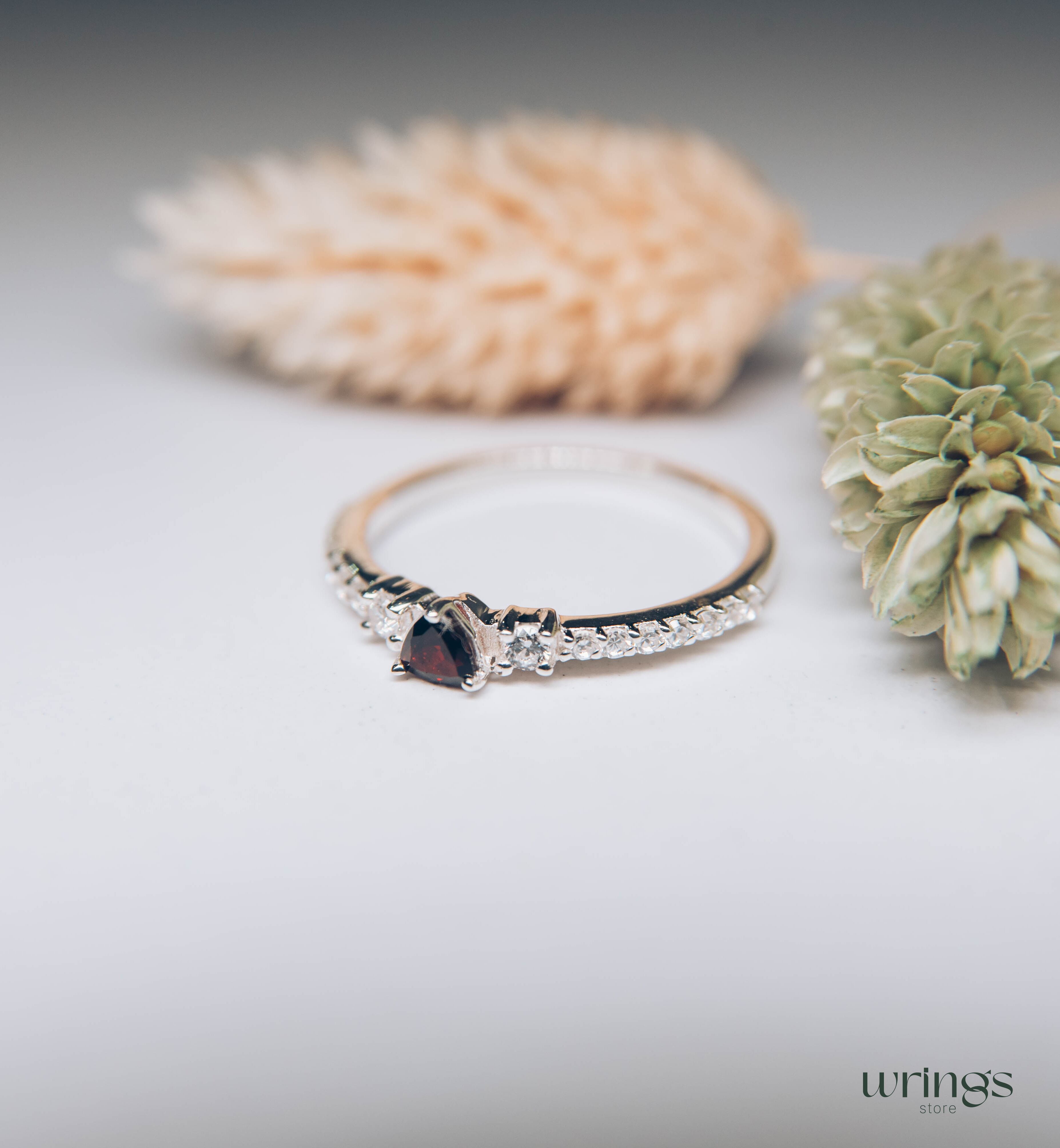 3 Stone Garnet Ring - Triillion central Gem & Side Zirconia