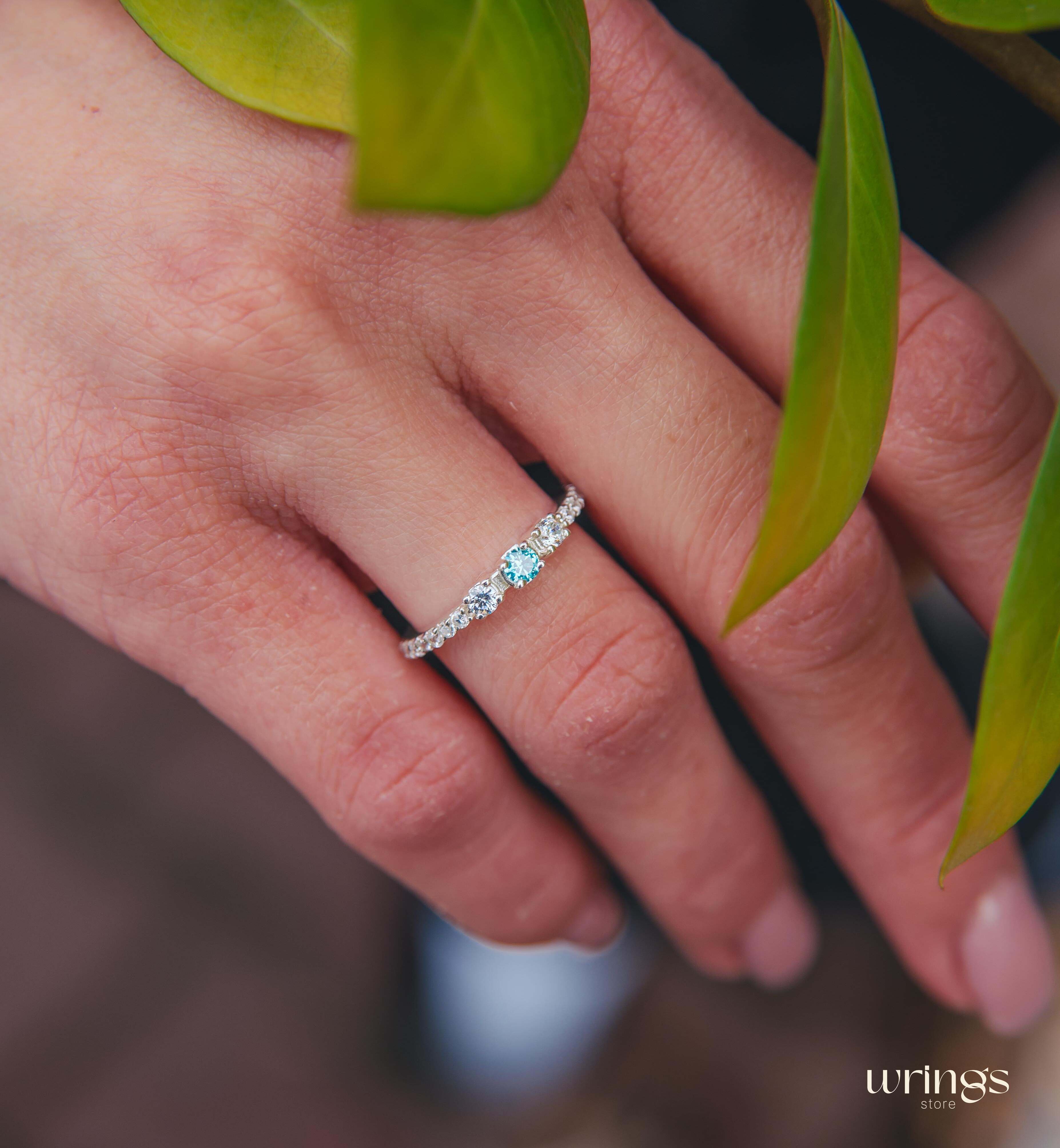 Central Swiss Topaz Silver Multi Stone Engagement Ring