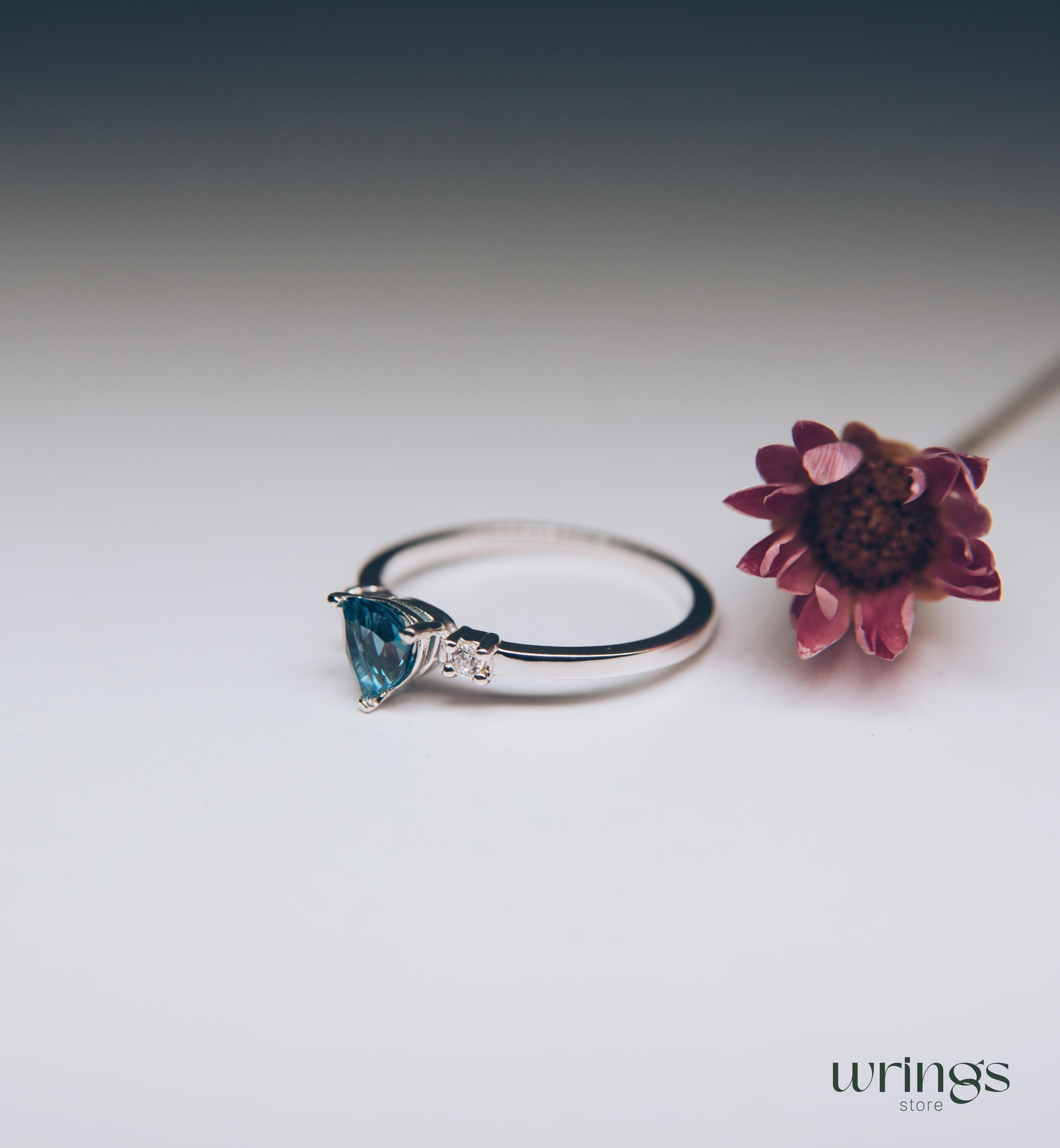 Large Trillion Blue Topaz Three Stone Engagement Ring