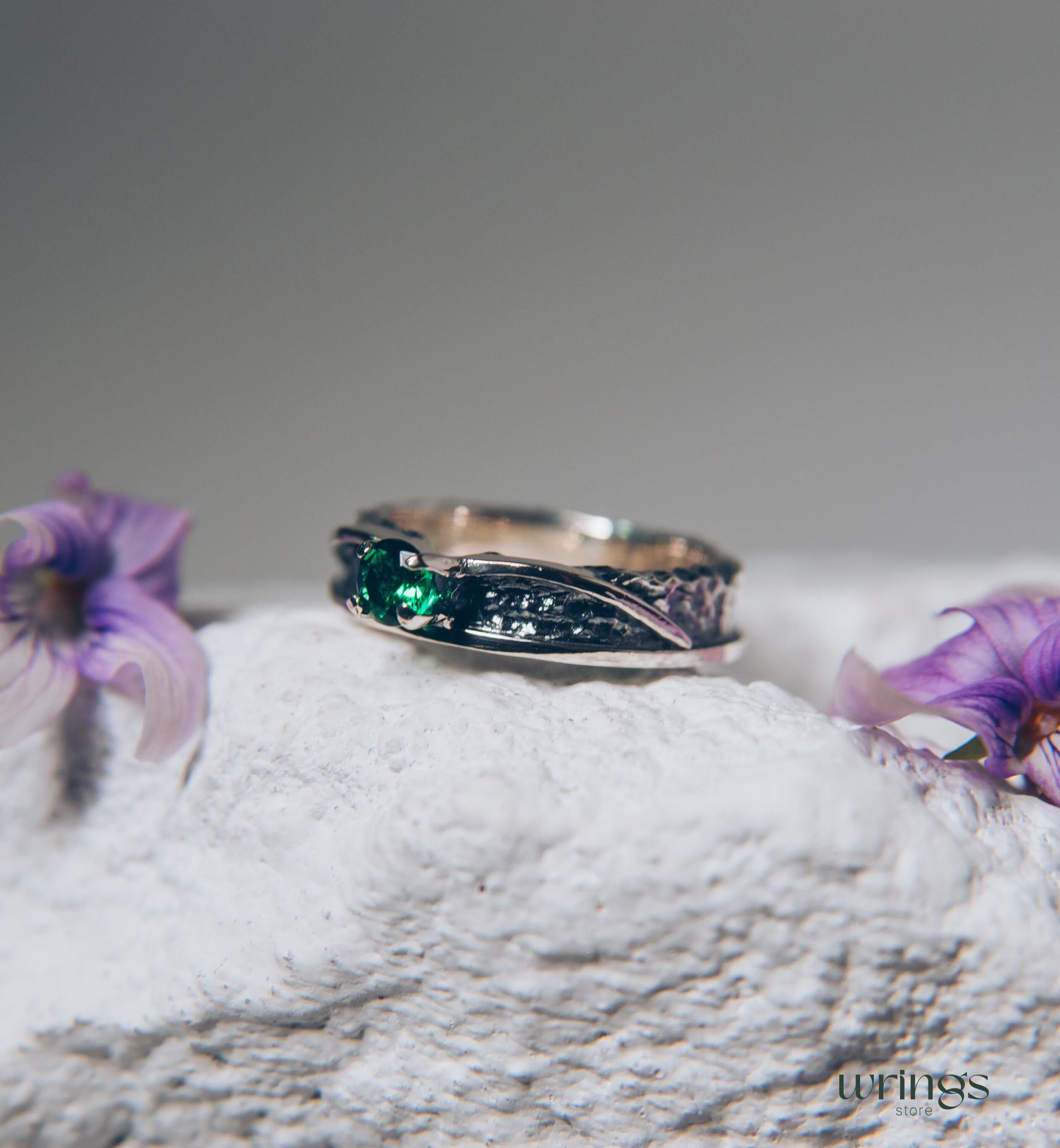 Avant garde Silver Hammered Engagement Ring with Emerald