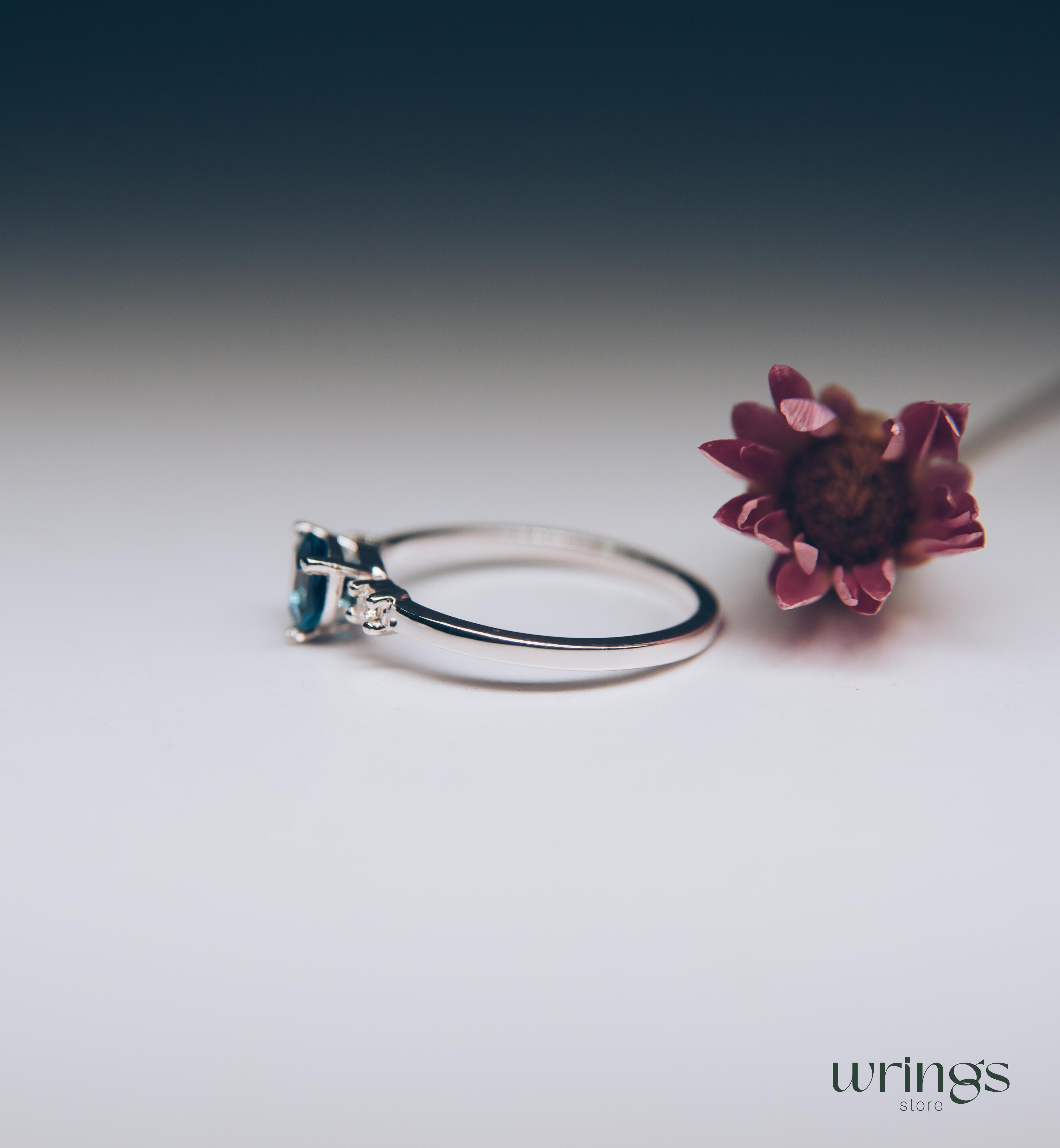 Large Trillion Blue Topaz Three Stone Engagement Ring