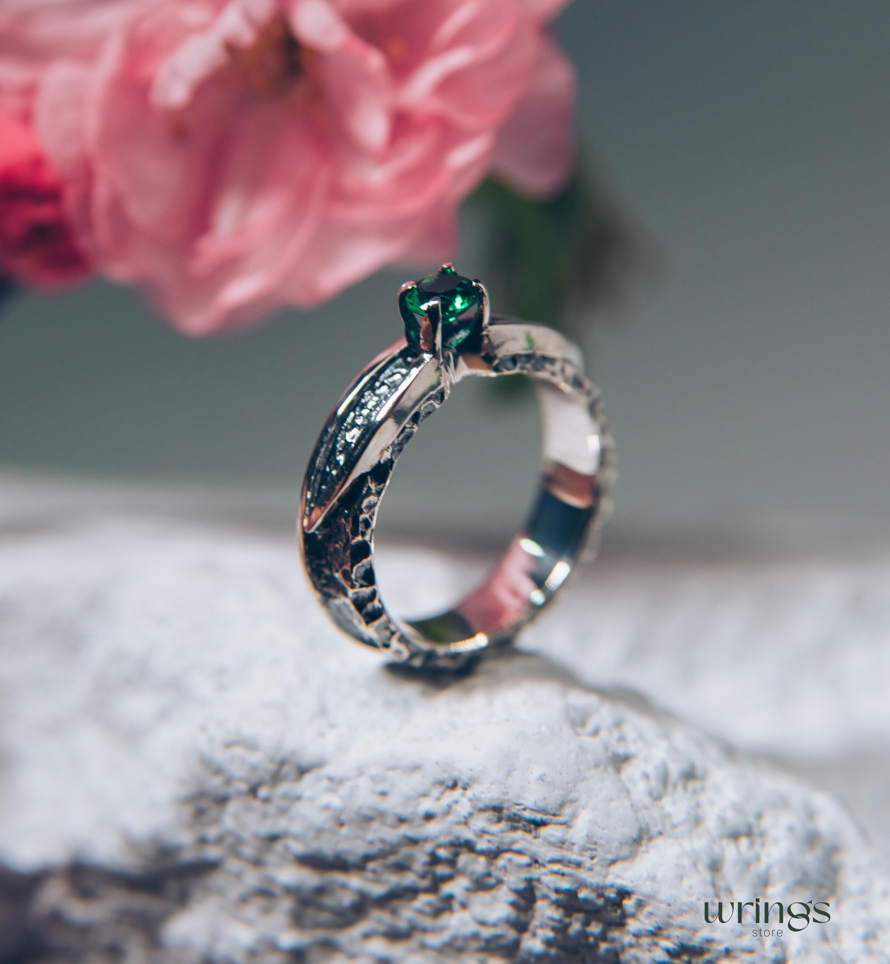 Avant garde Silver Hammered Engagement Ring with Emerald