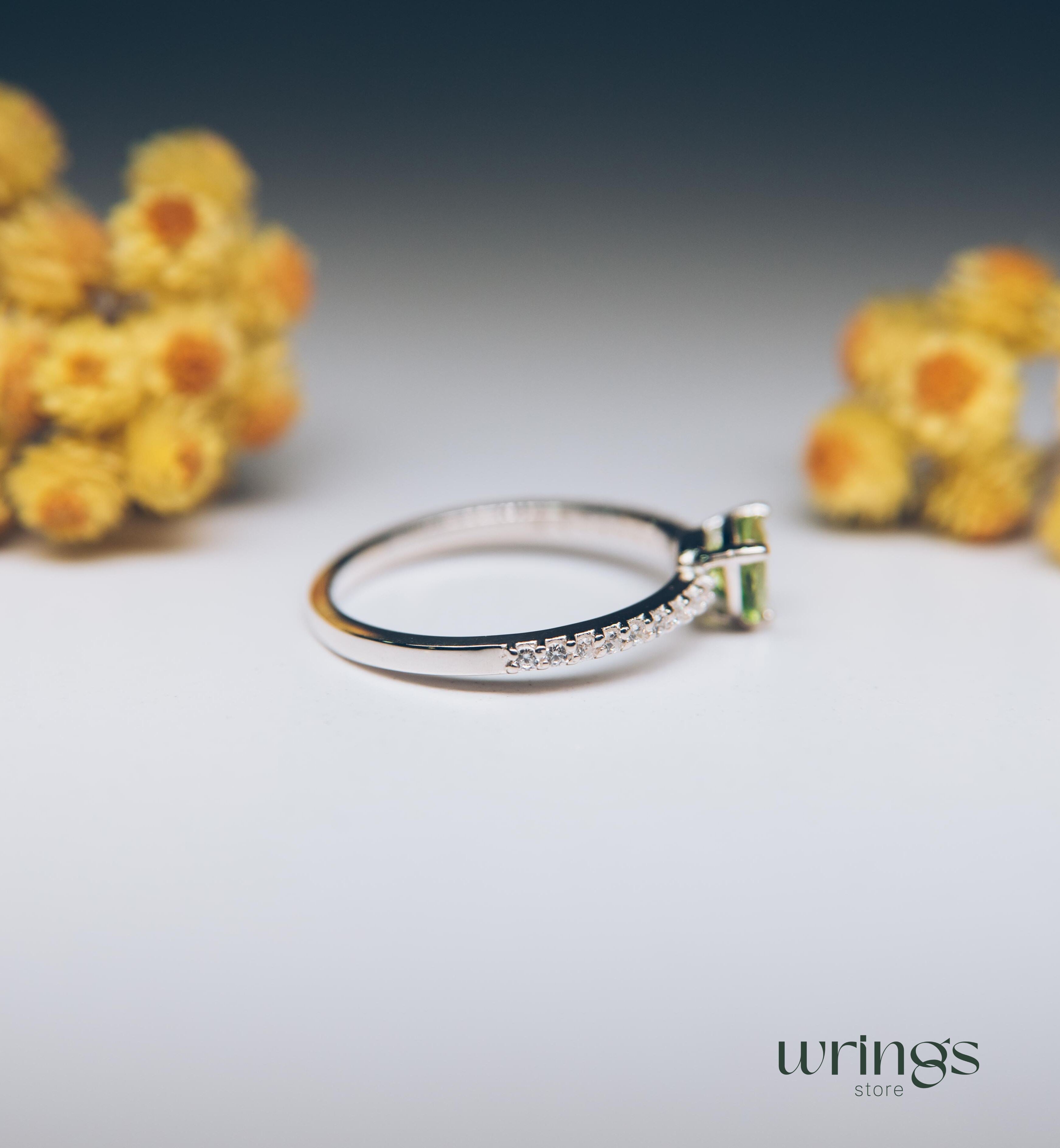 Trilliant Peridot Engagement Ring & CZ Side Stones