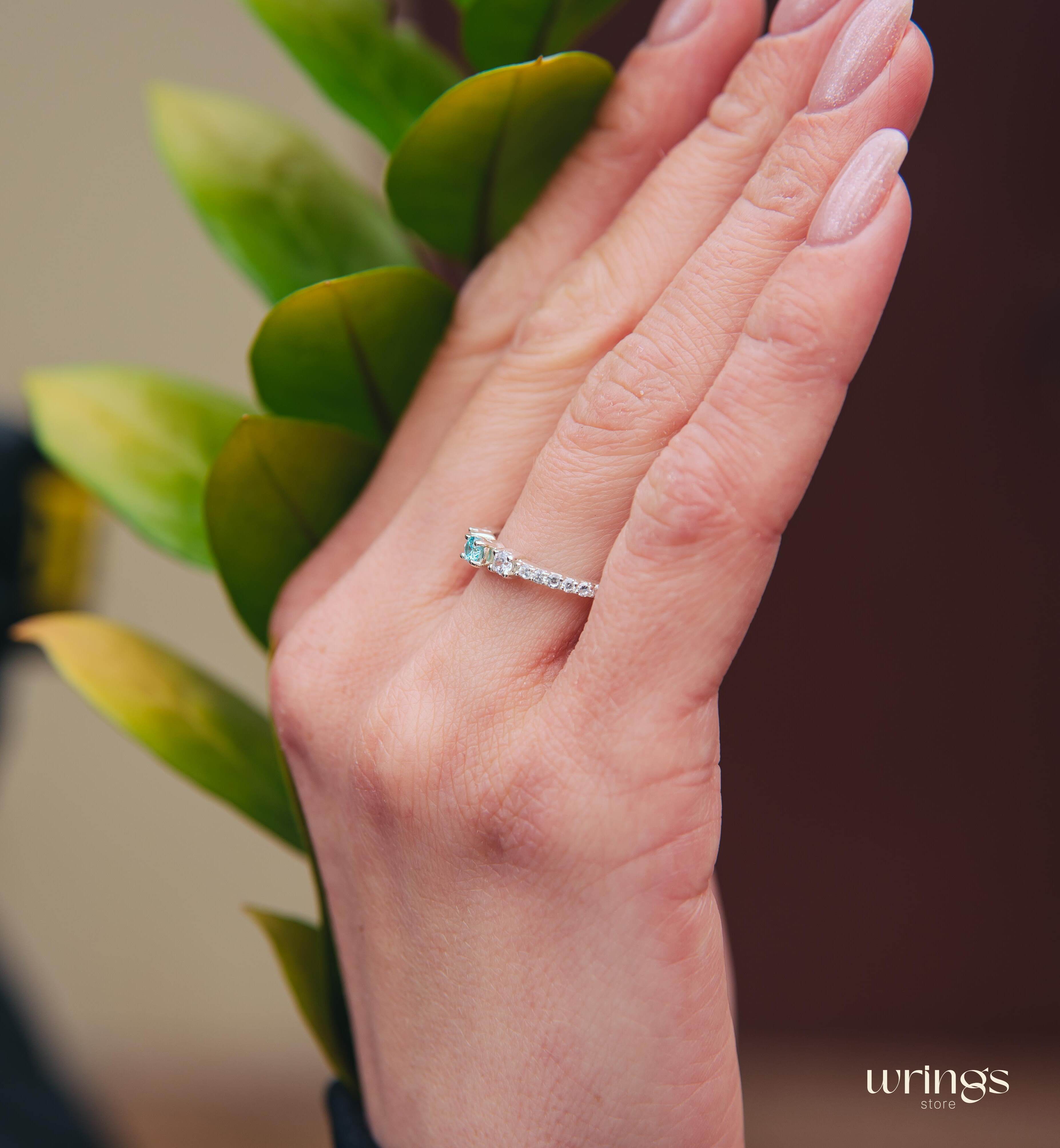 Central Swiss Topaz Silver Multi Stone Engagement Ring