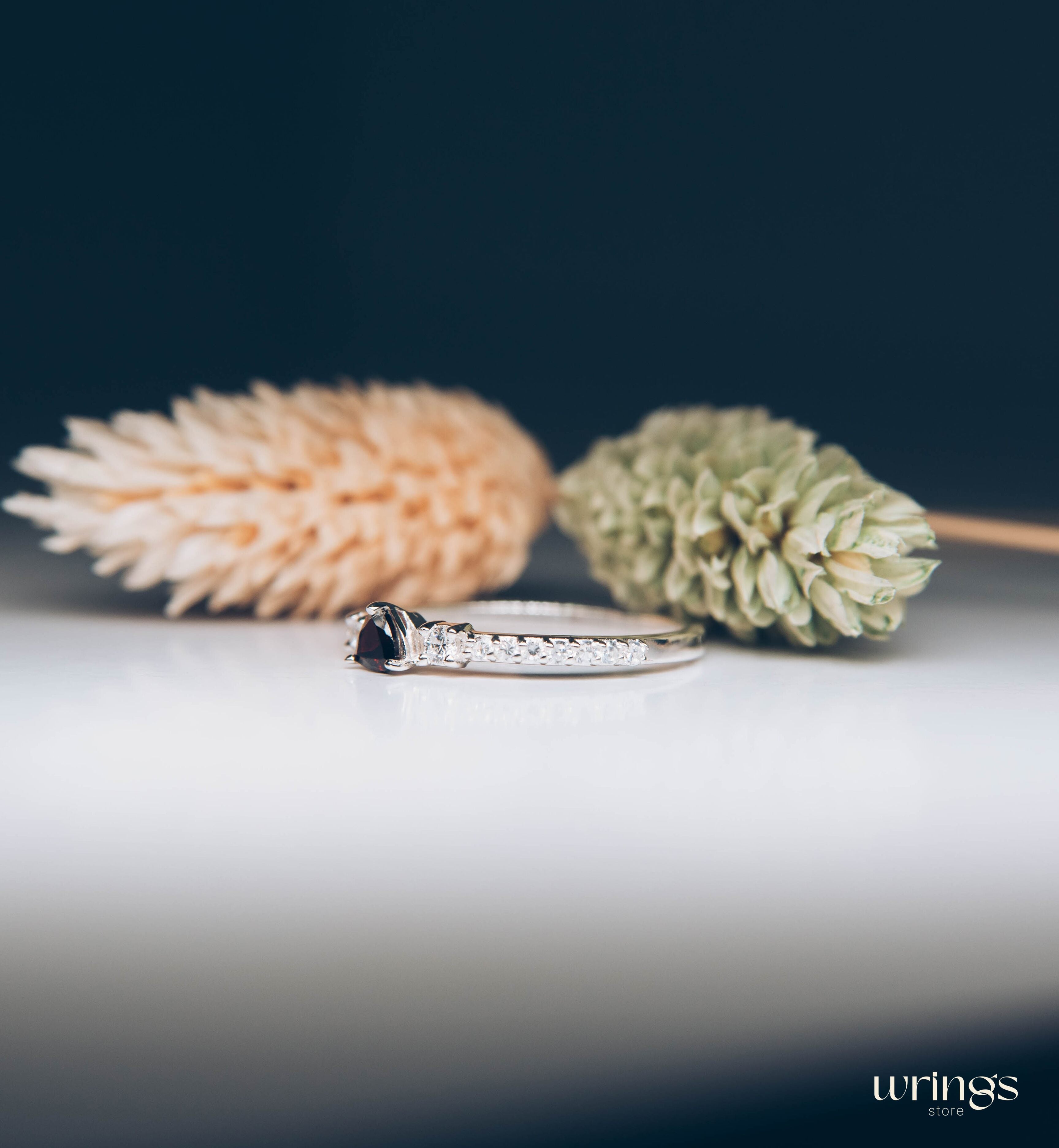 3 Stone Garnet Ring - Triillion central Gem & Side Zirconia
