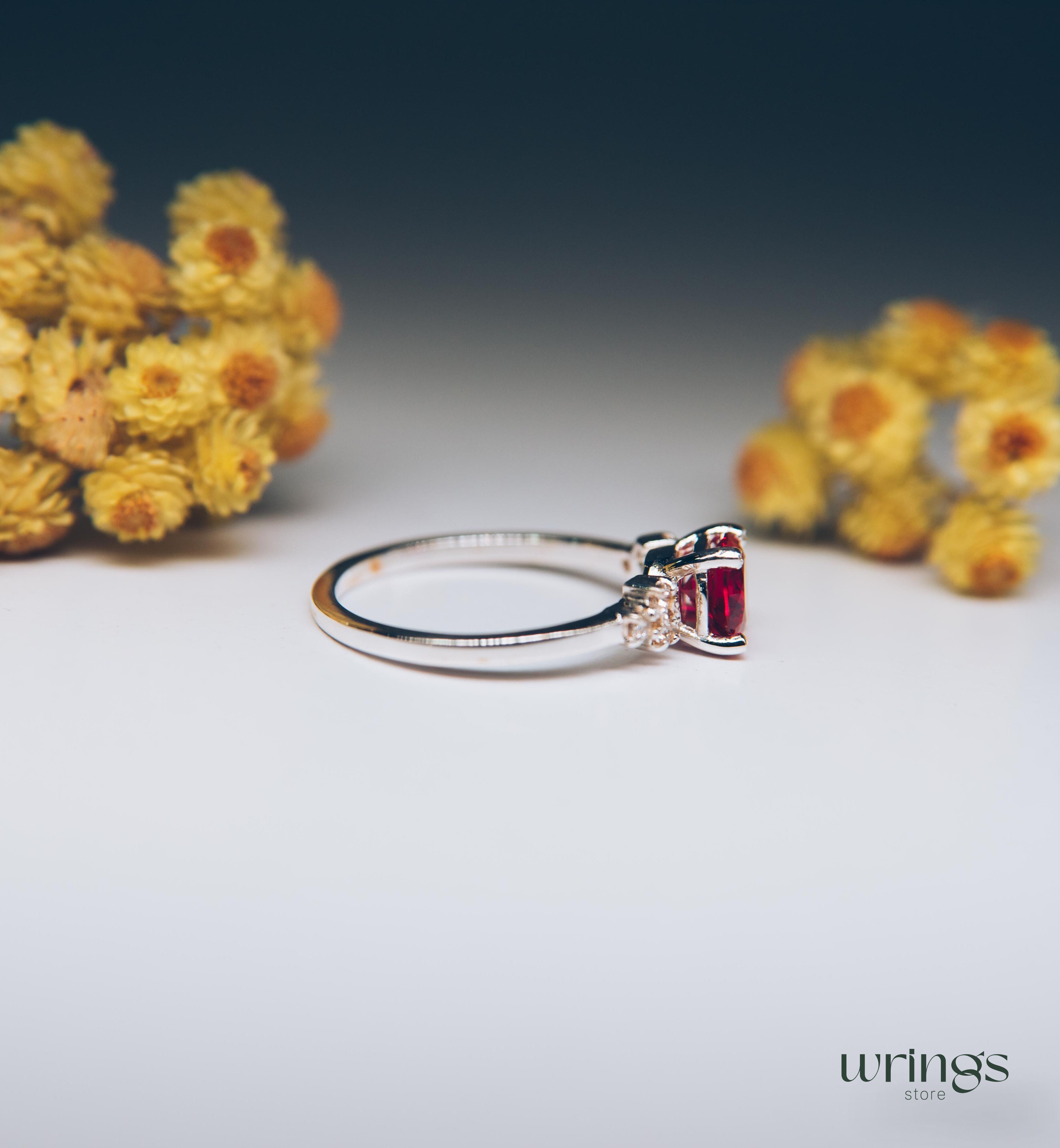 Large Simulated Ruby Engagement Ring Cluster Side Stones