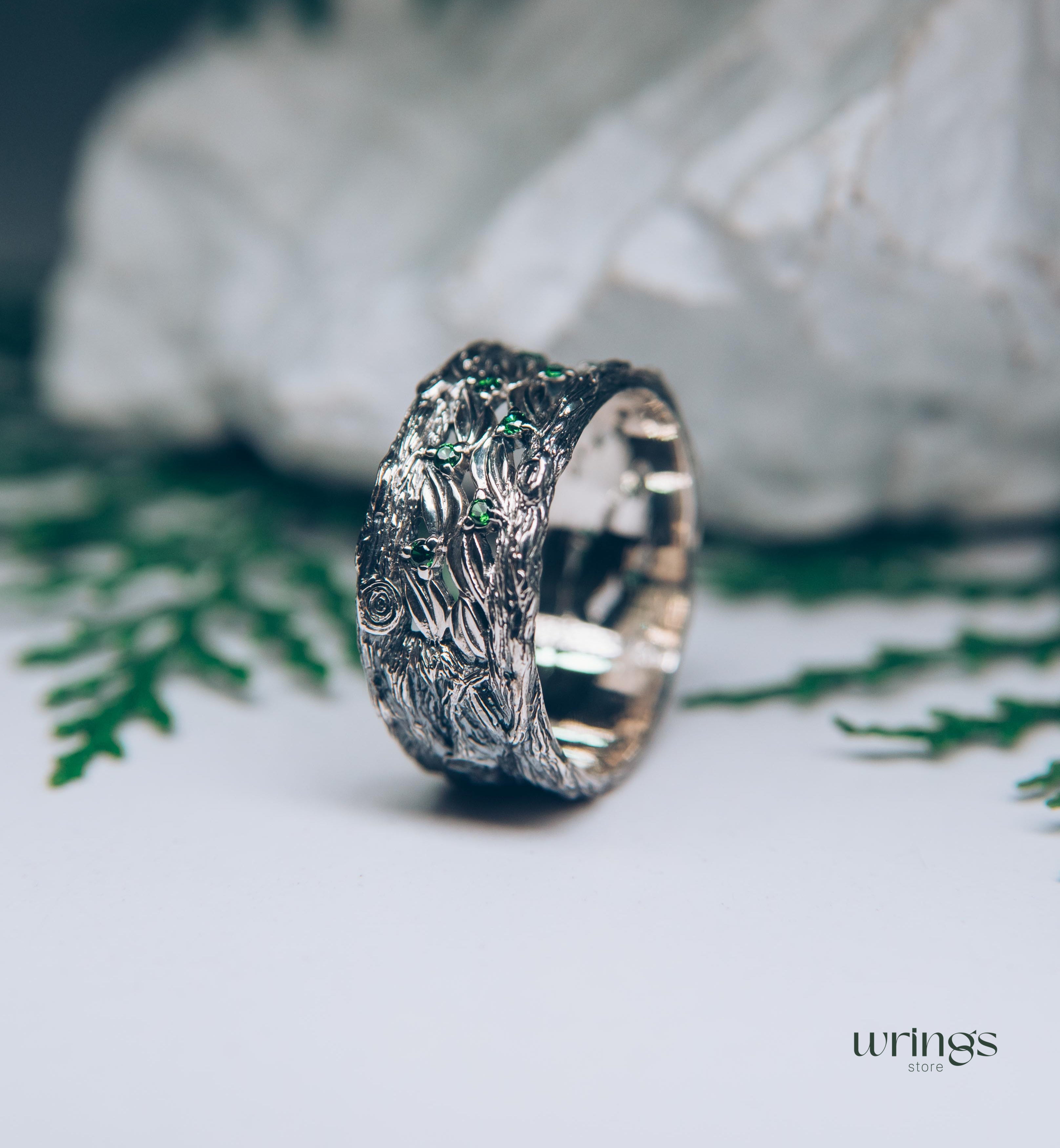 Silver Leaves and Branch Statement Wedding Band with Emeralds