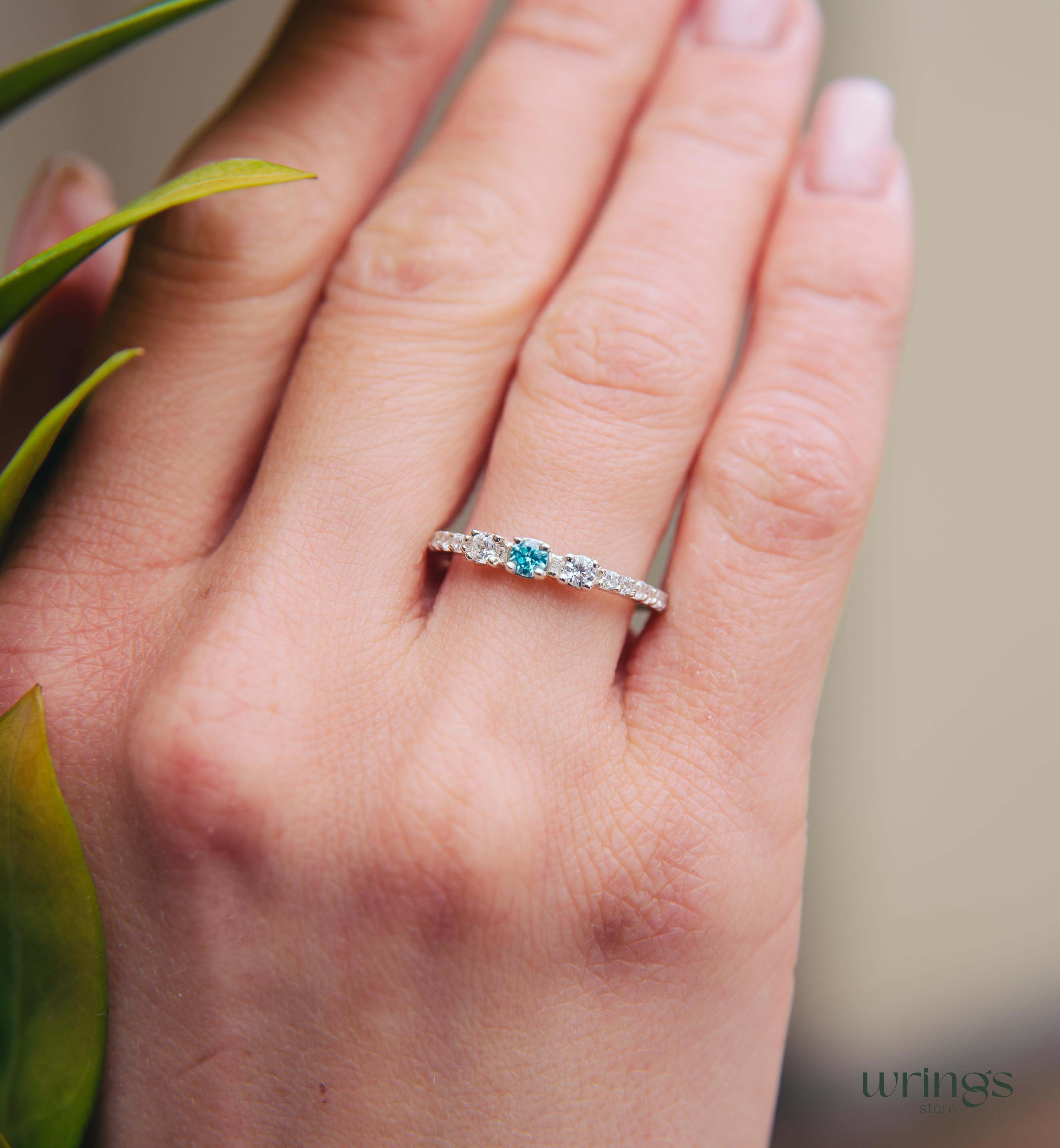 Central Swiss Topaz Silver Multi Stone Engagement Ring