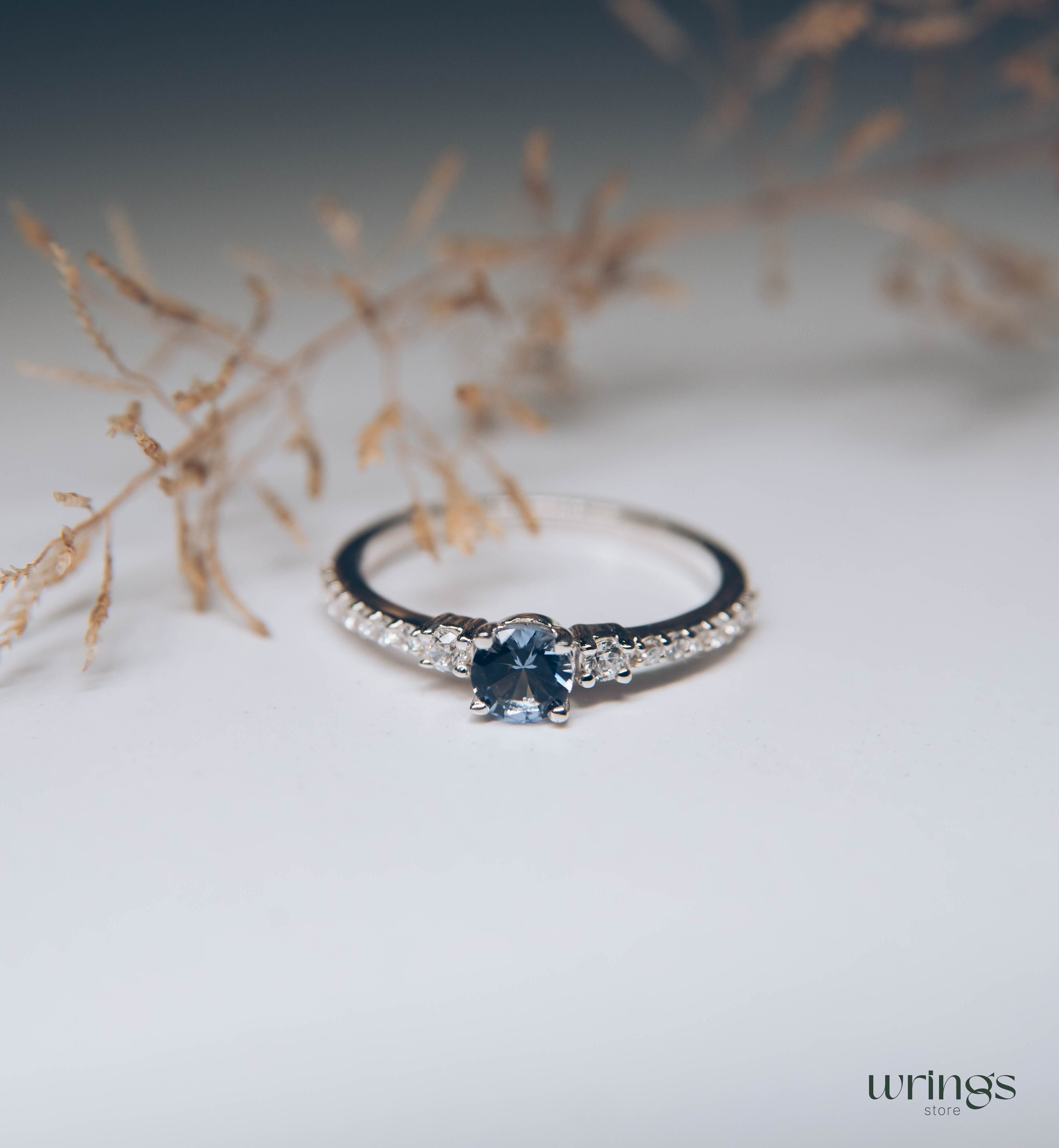 Tanzanite & CZ Side Stones Silver Engagement Ring