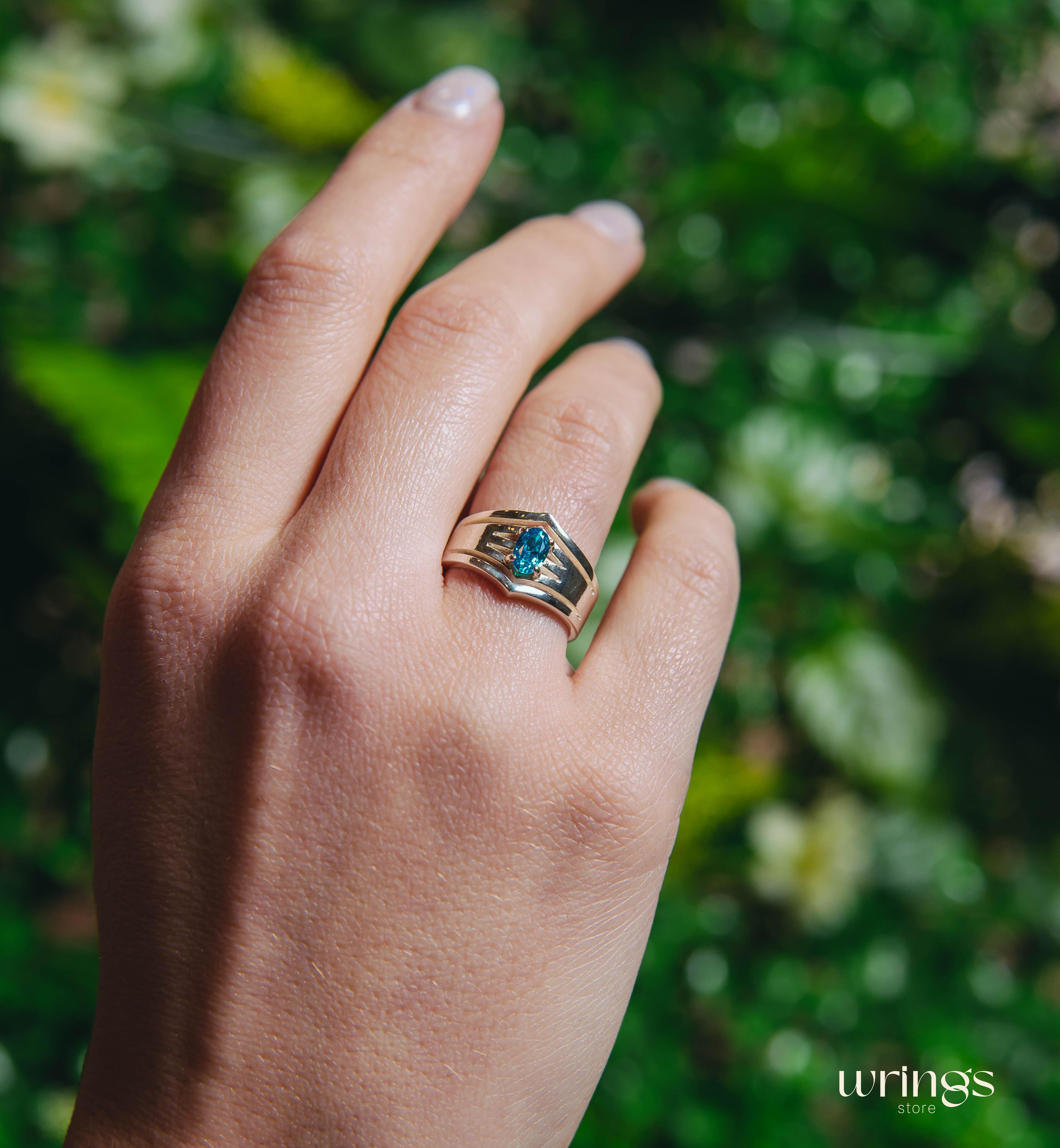 Double V-shaped Cocktail Oval Blue Topaz Ring Silver