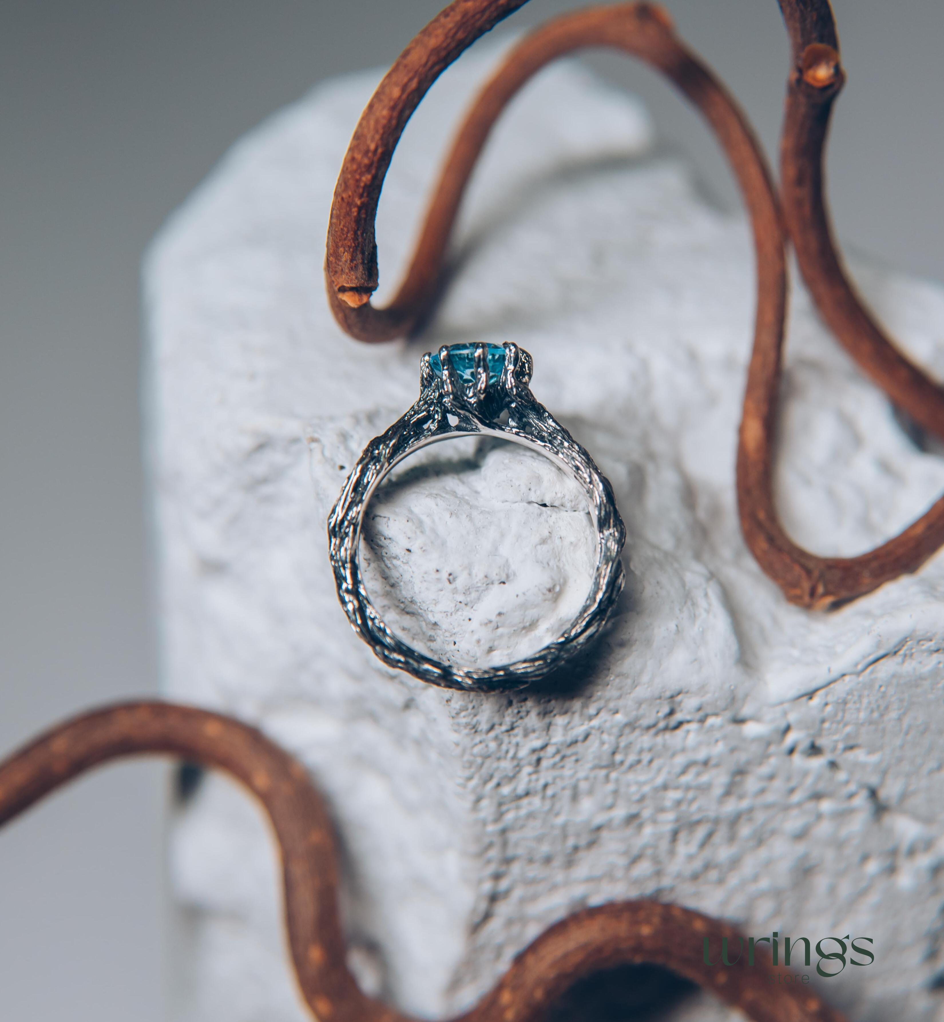 Vivid Topaz Engagement Ring with Silver Branch