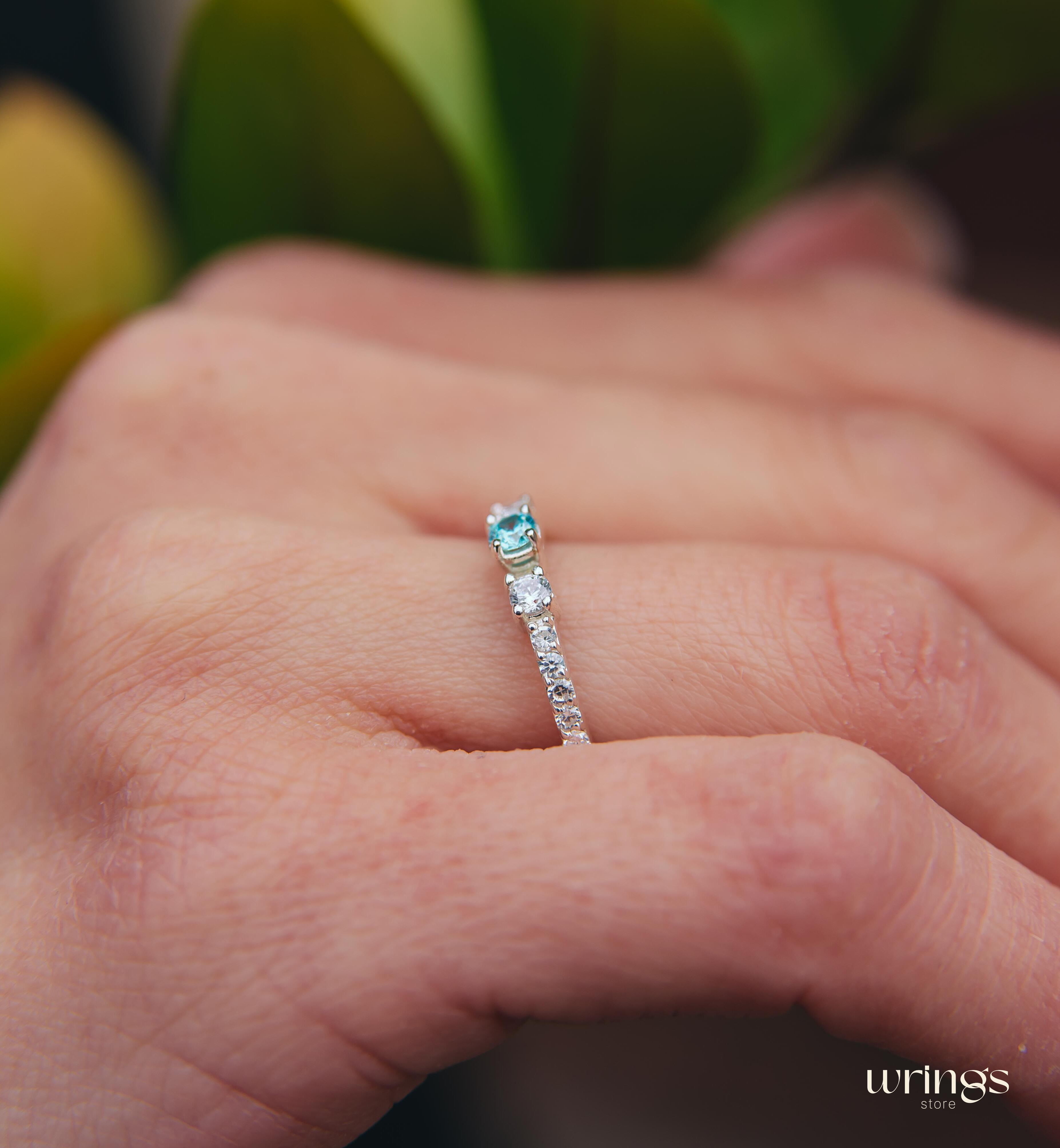 Central Swiss Topaz Silver Multi Stone Engagement Ring