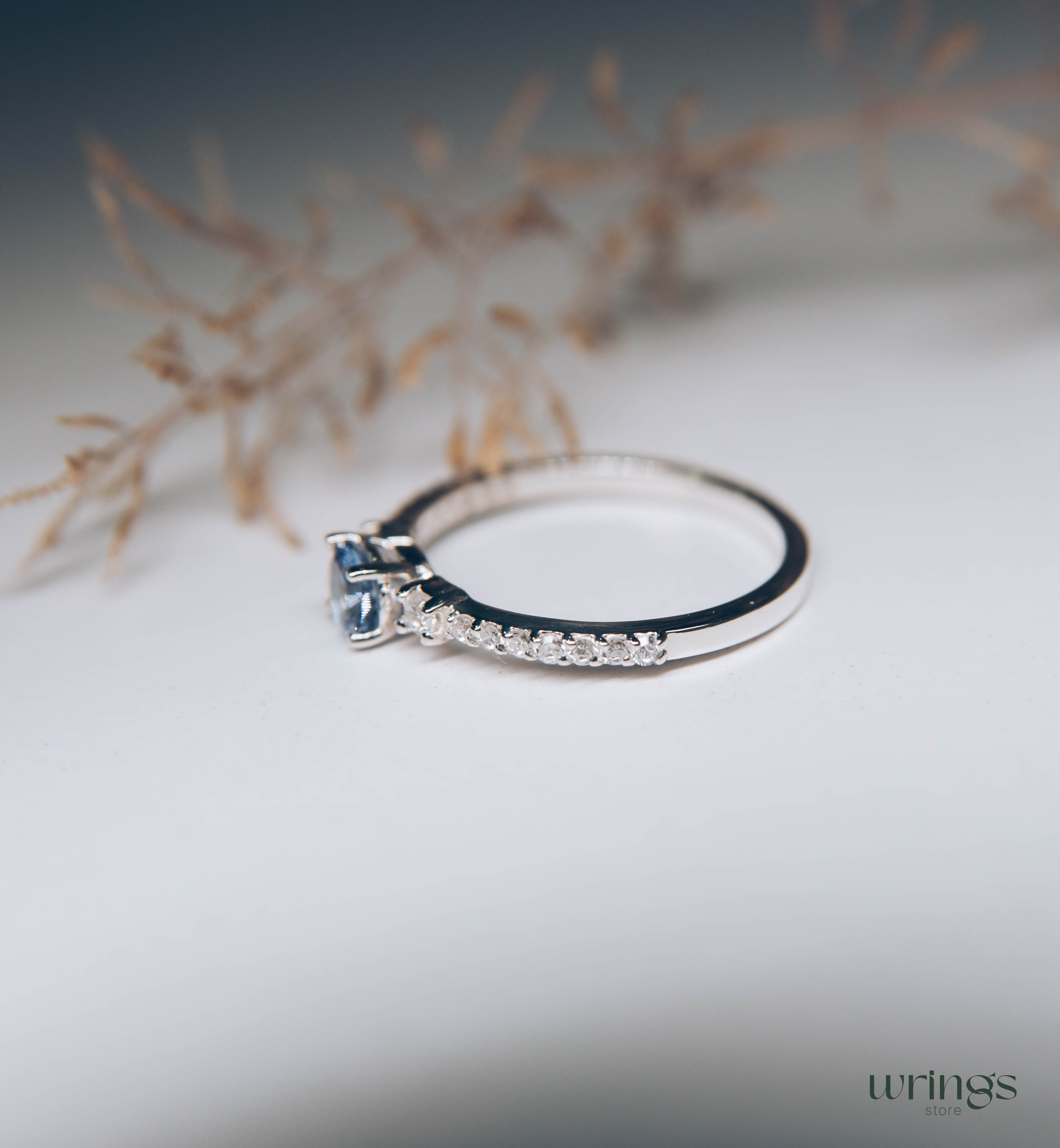 Tanzanite & CZ Side Stones Silver Engagement Ring
