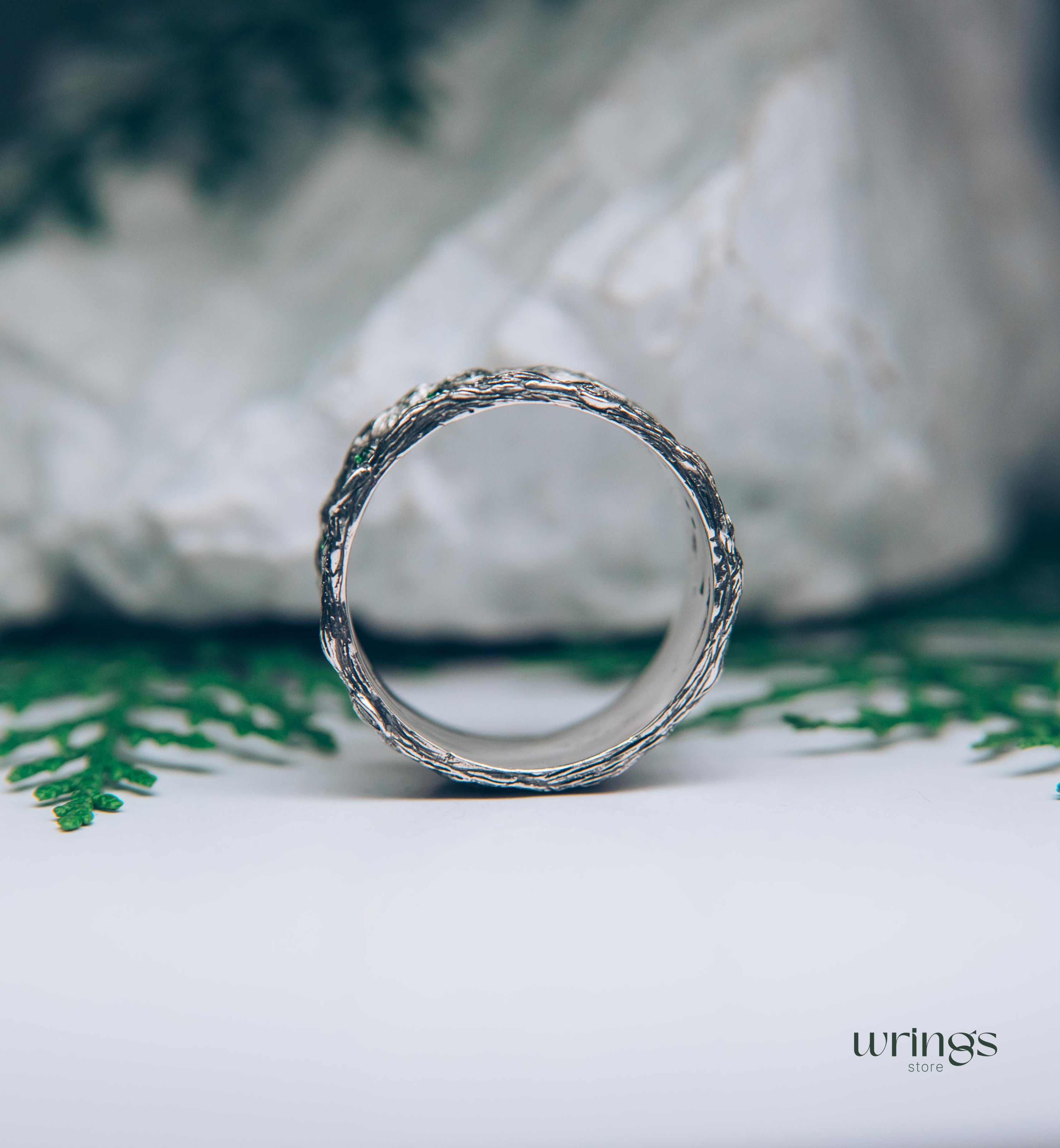 Silver Leaves and Branch Statement Wedding Band with Emeralds