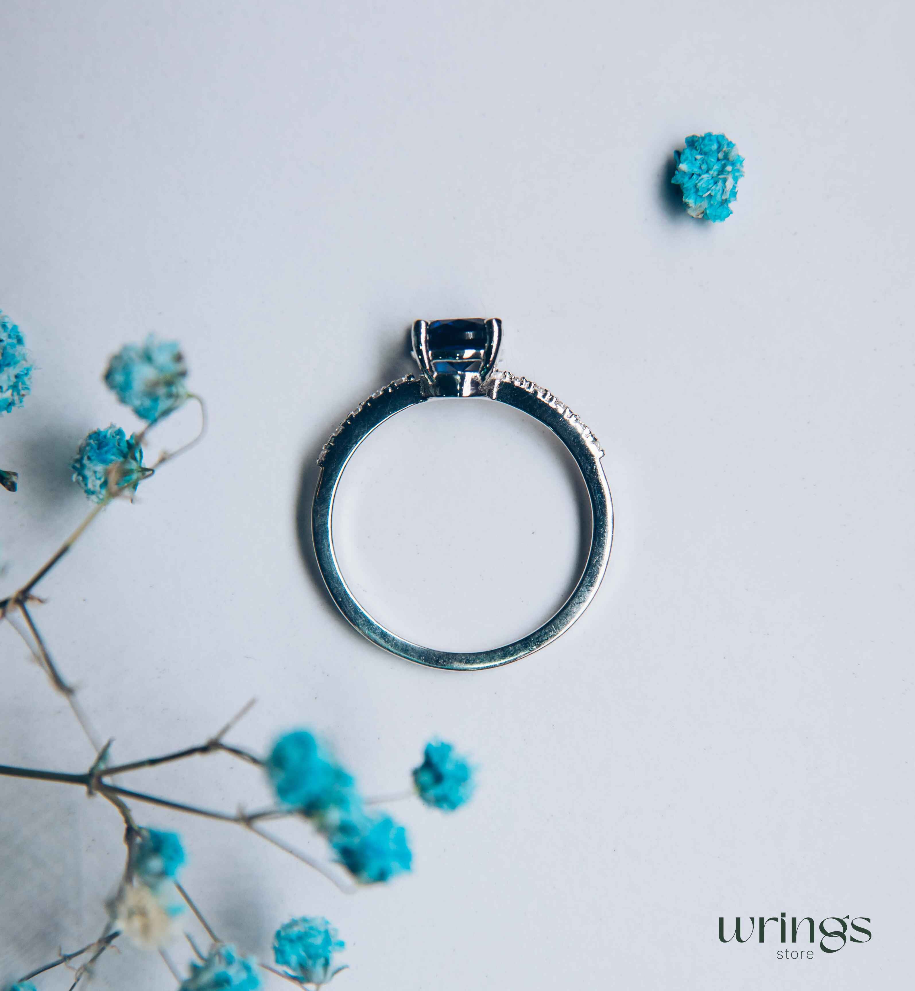 Large Simulated Sapphire Engagement Ring with Side Stones