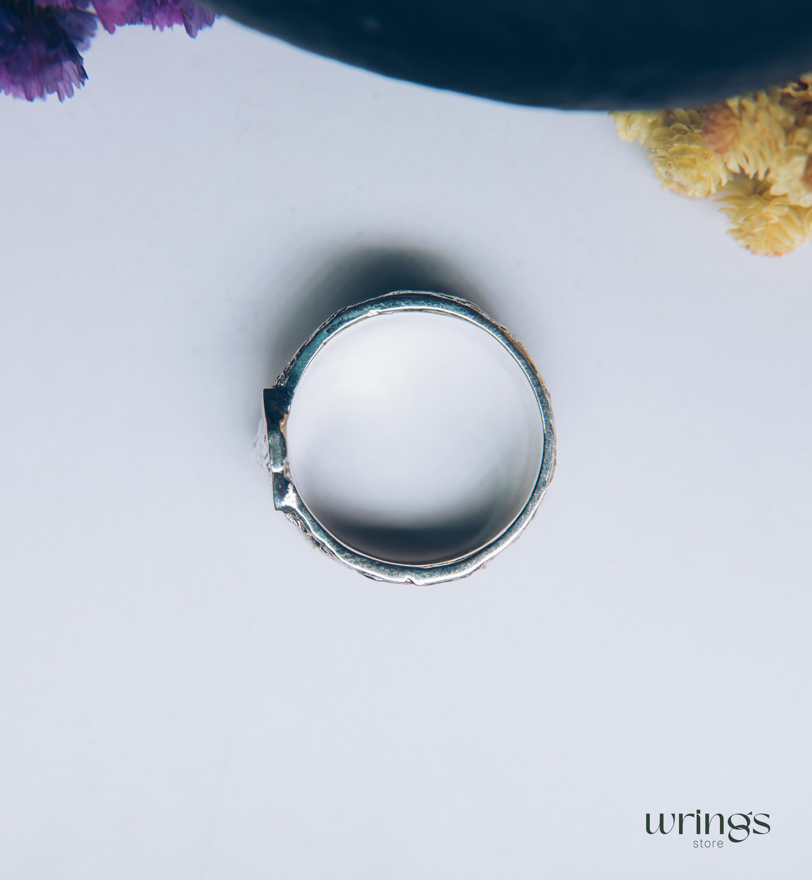 Unique Solid Silver Lion head Ring for Men placed in a Shield