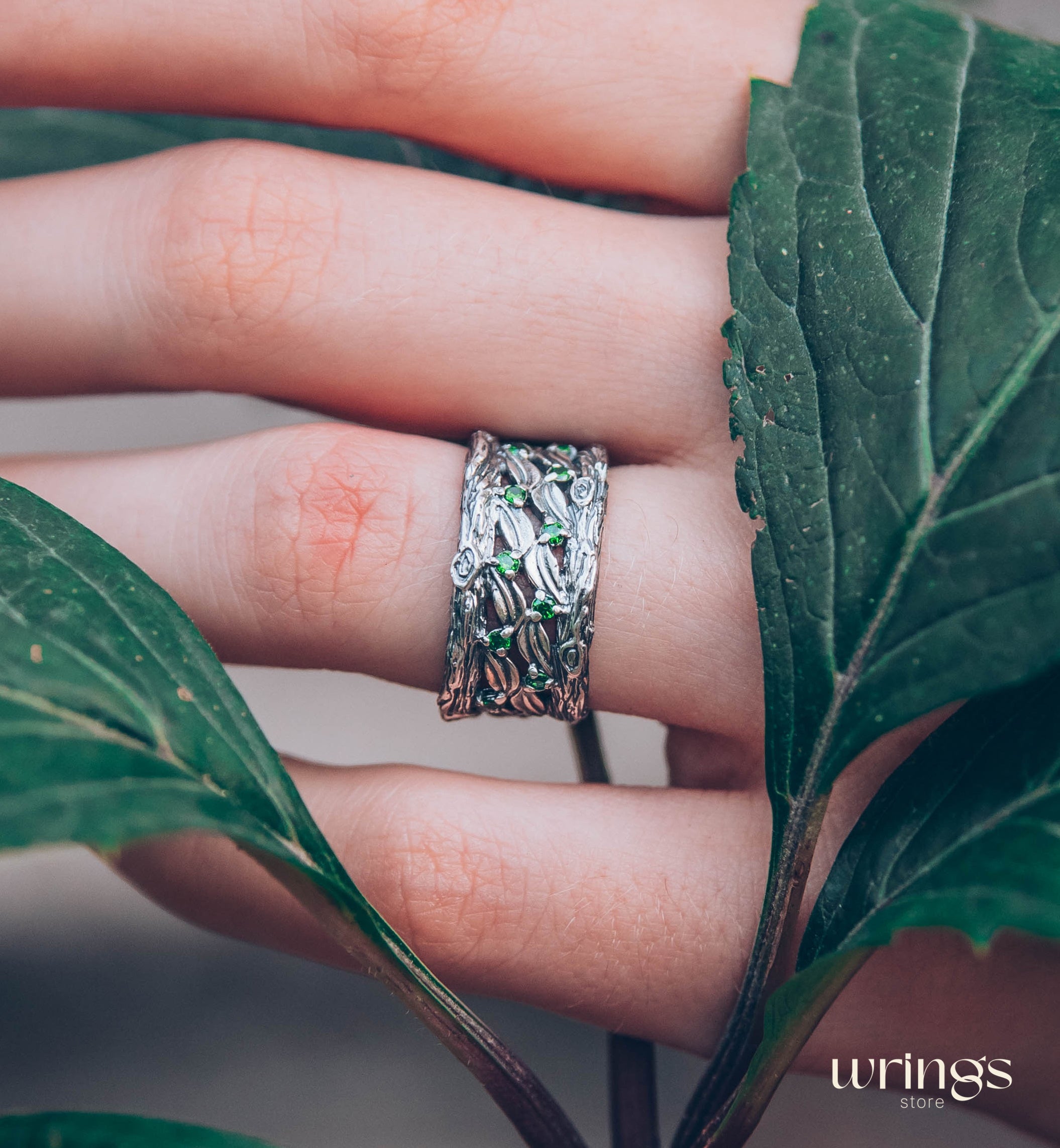 Silver Leaves and Branch Statement Wedding Band with Emeralds