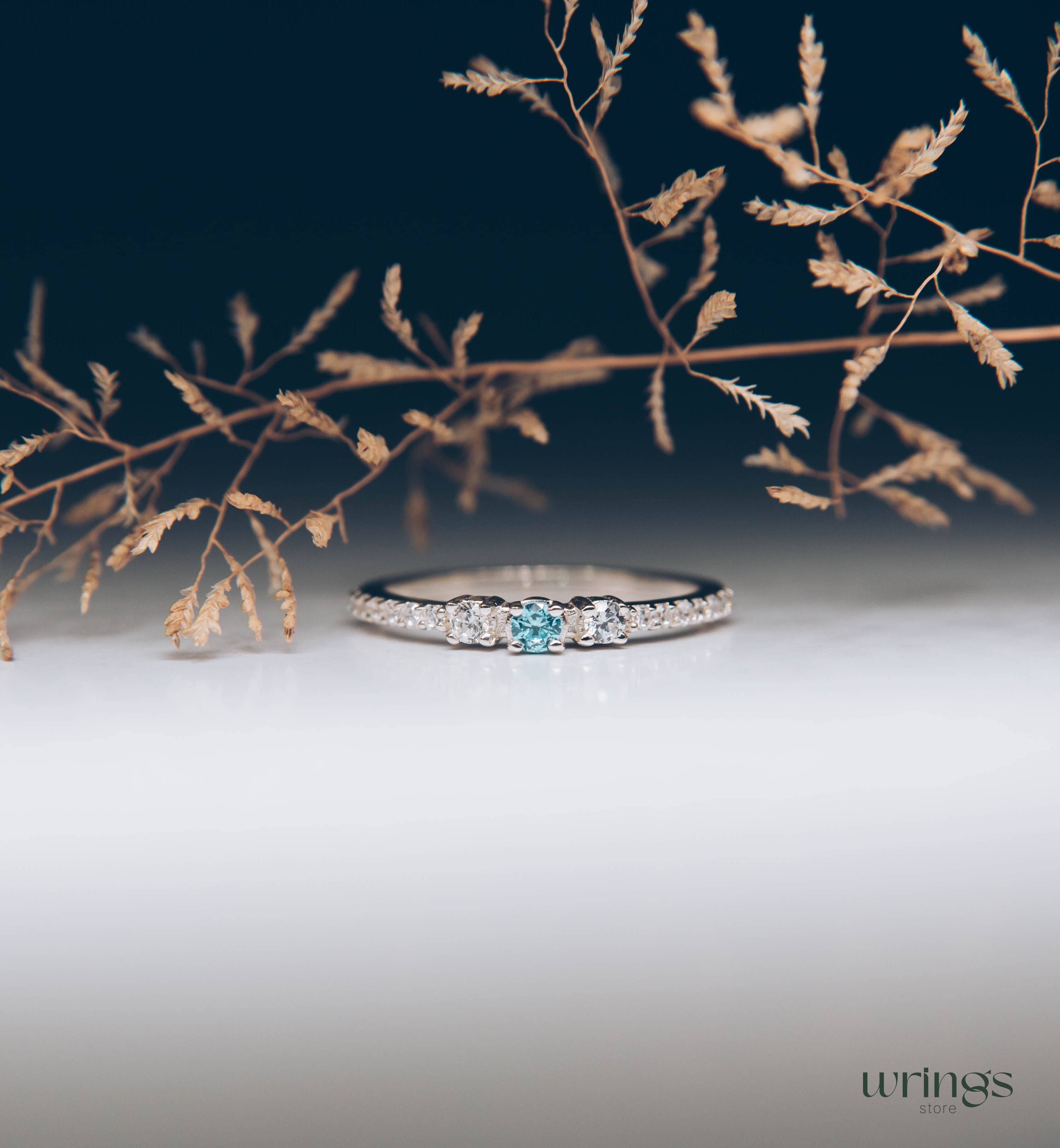 Central Swiss Topaz Silver Multi Stone Engagement Ring