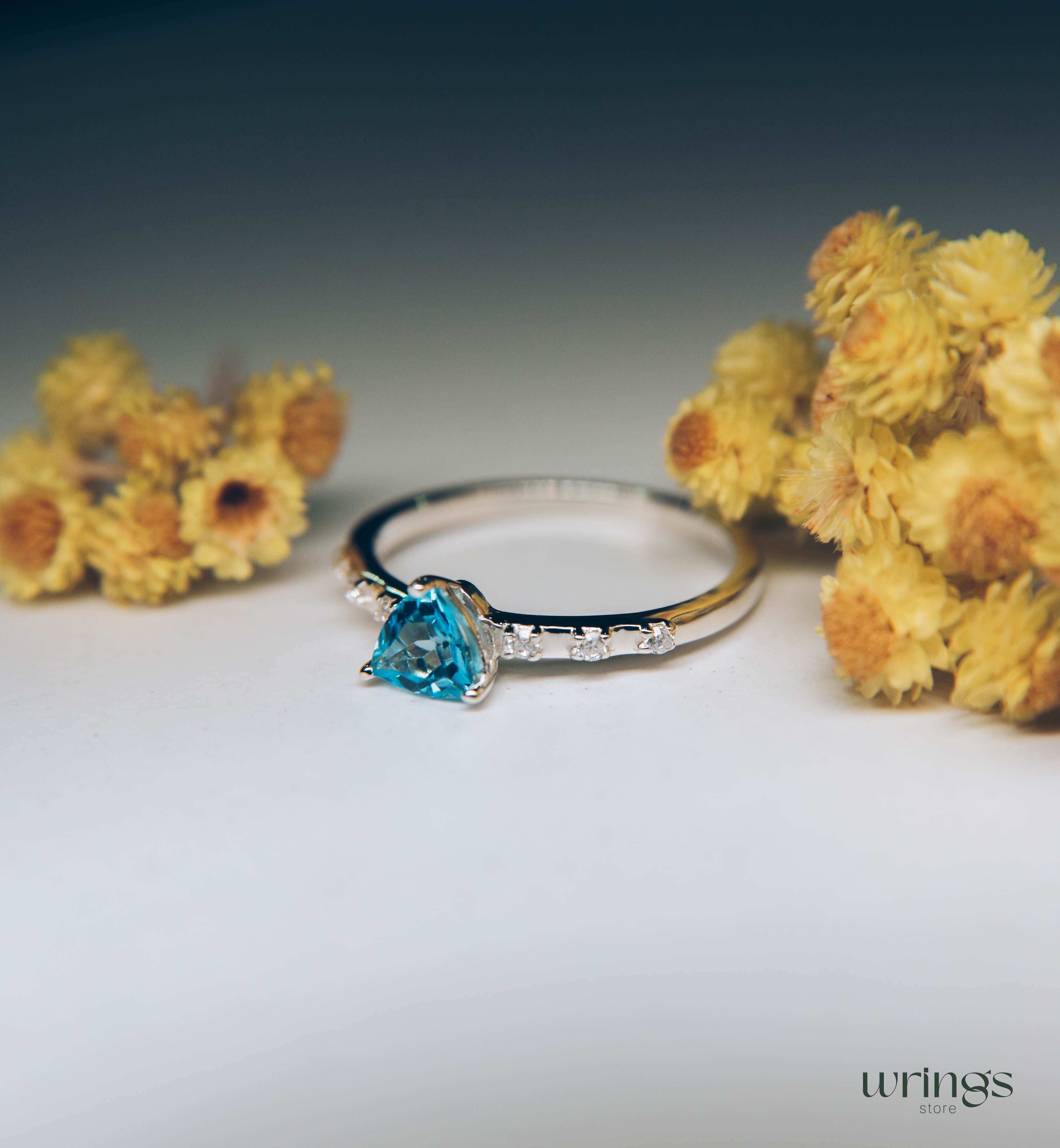 Pretty Trilliant Swiss Topaz Engagement Ring & Accents