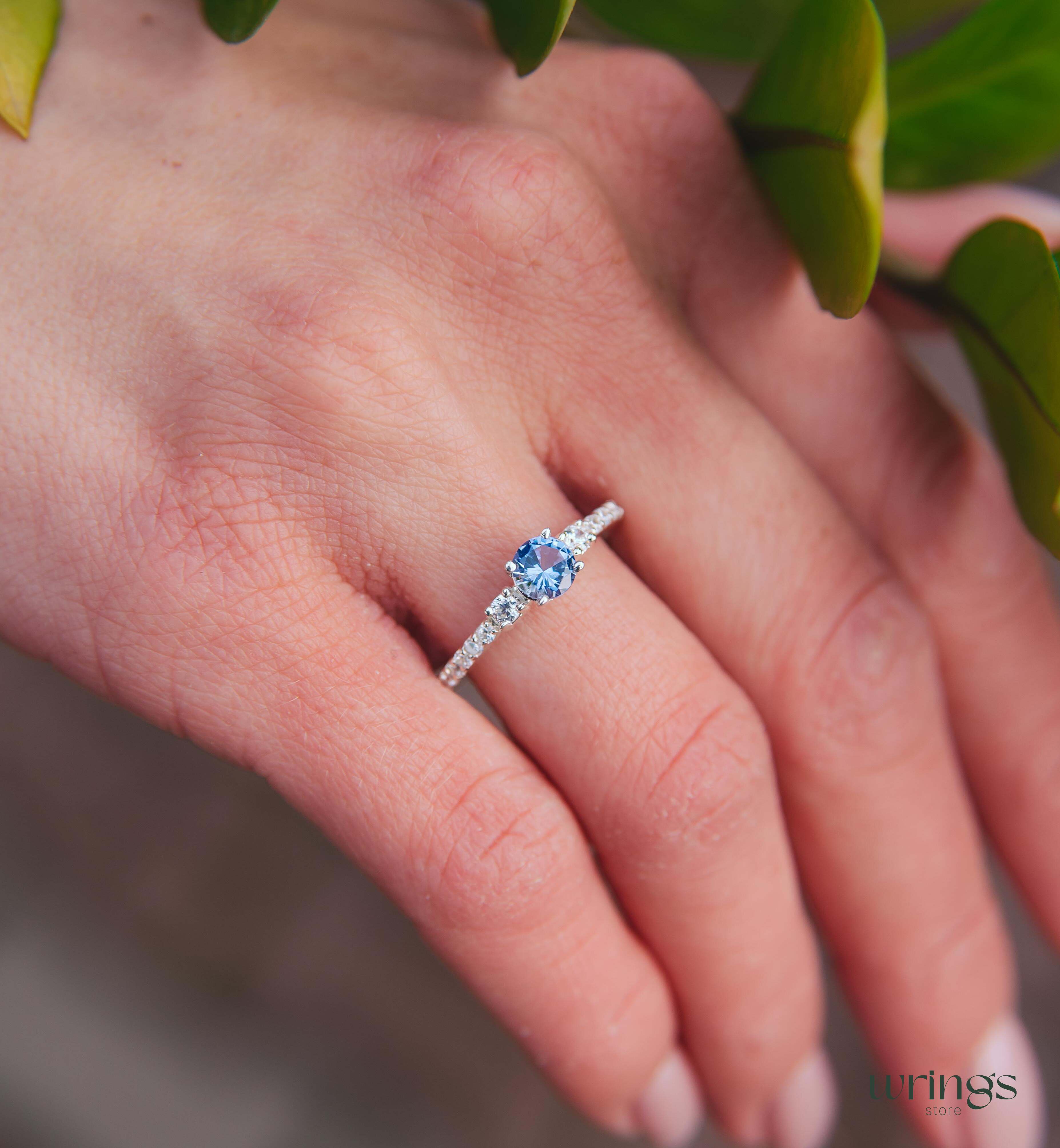 Tanzanite & CZ Side Stones Silver Engagement Ring