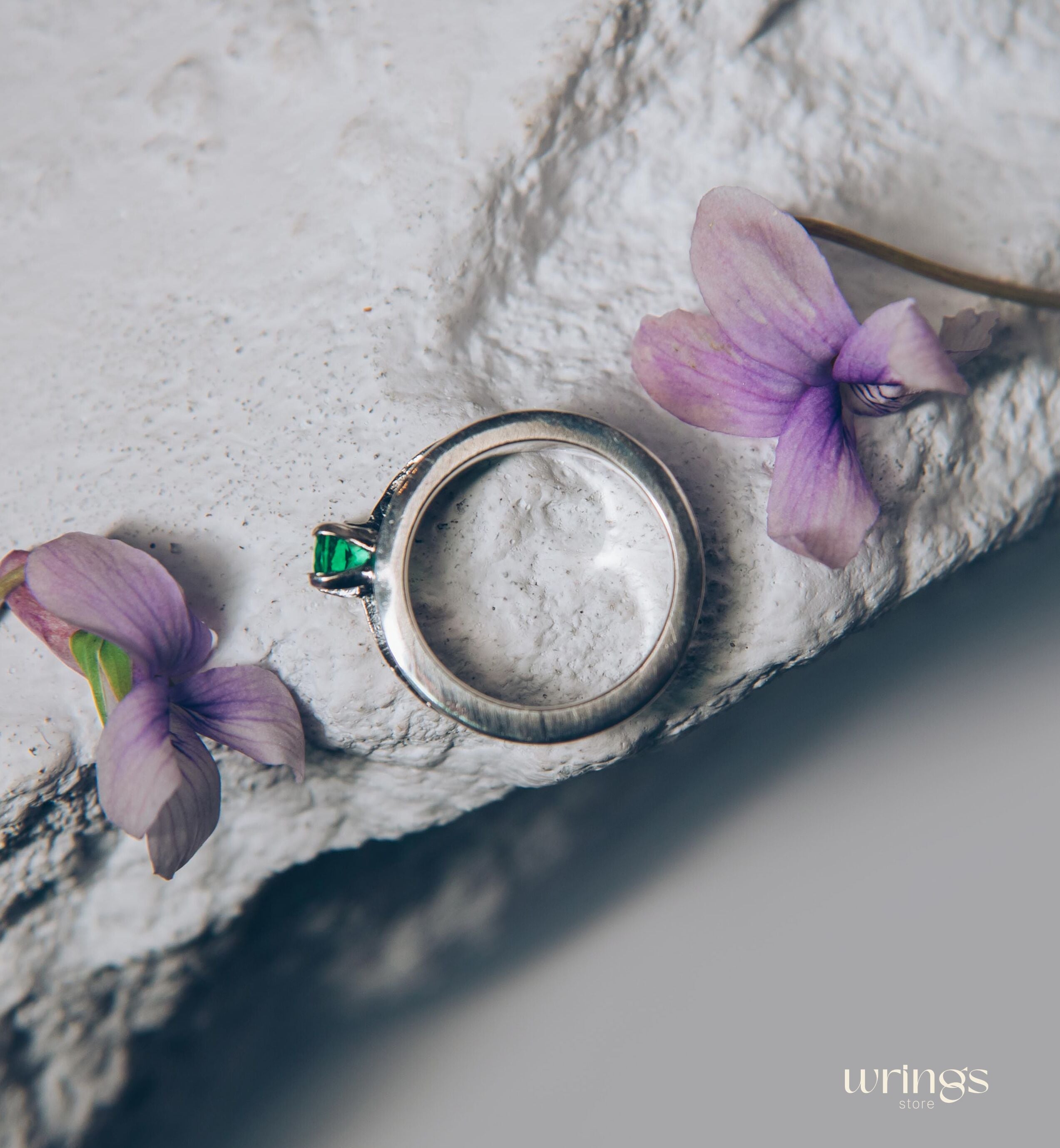 Avant garde Silver Hammered Engagement Ring with Emerald