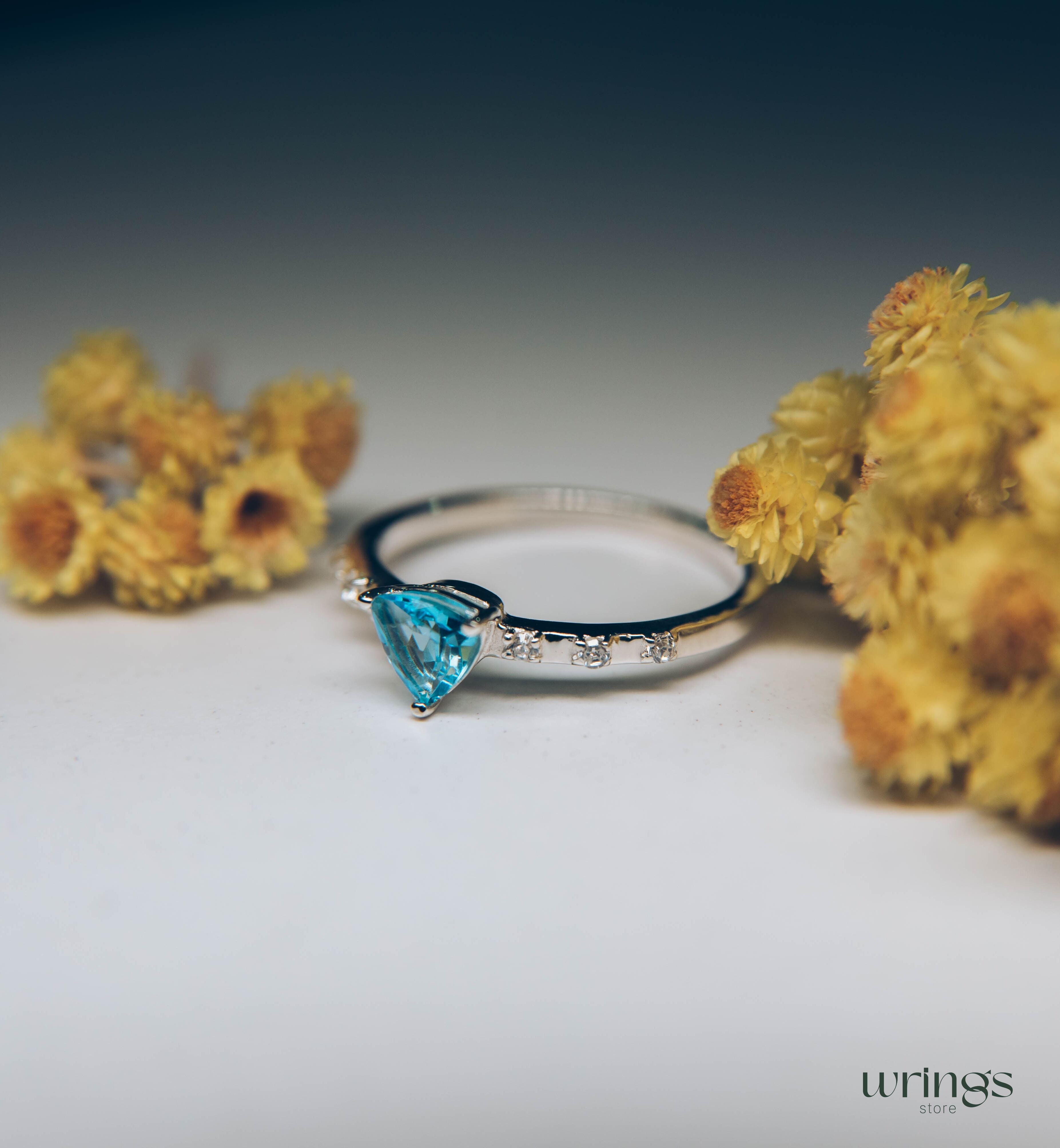 Pretty Trilliant Swiss Topaz Engagement Ring & Accents