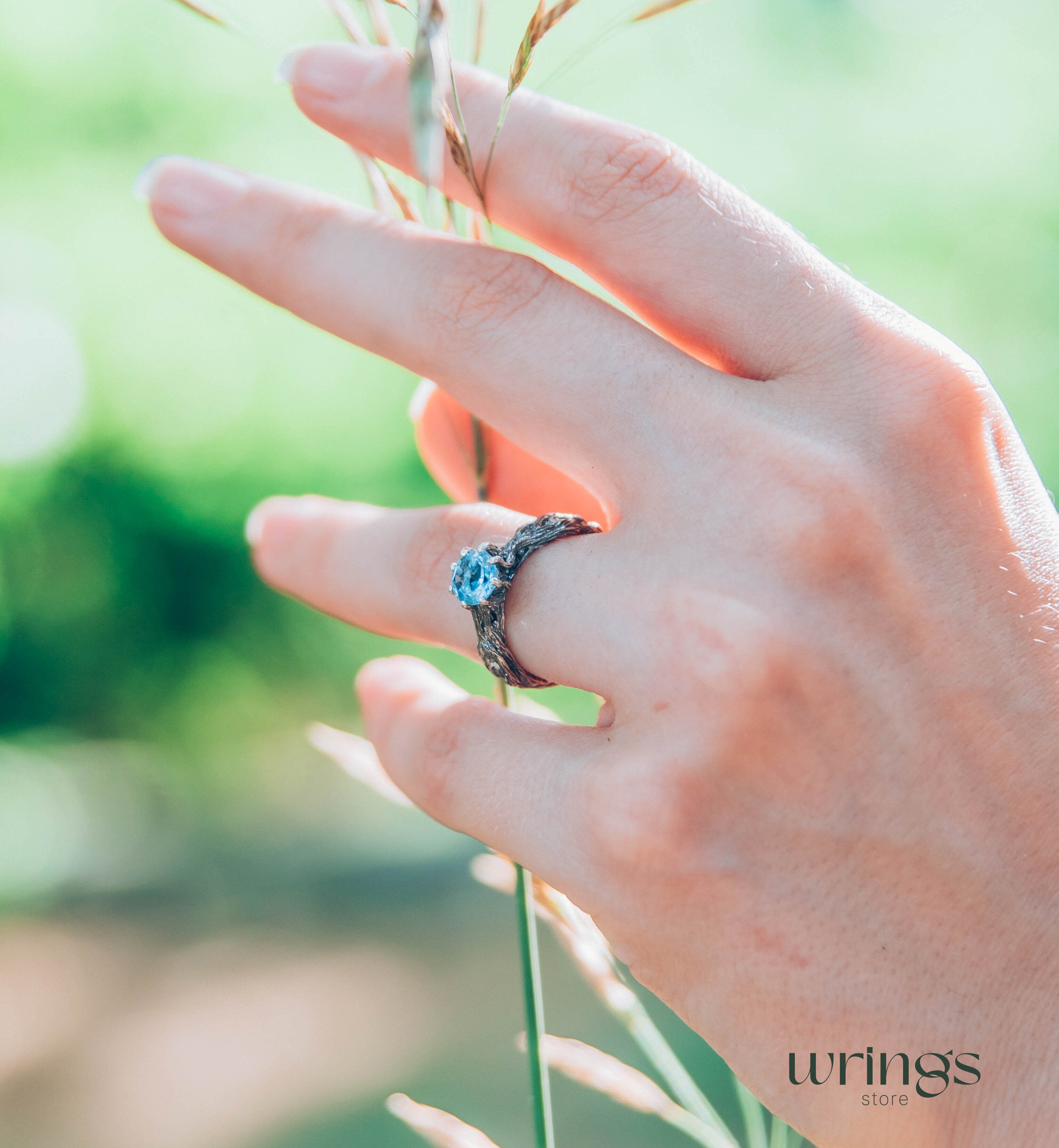 Vivid Topaz Engagement Ring with Silver Branch