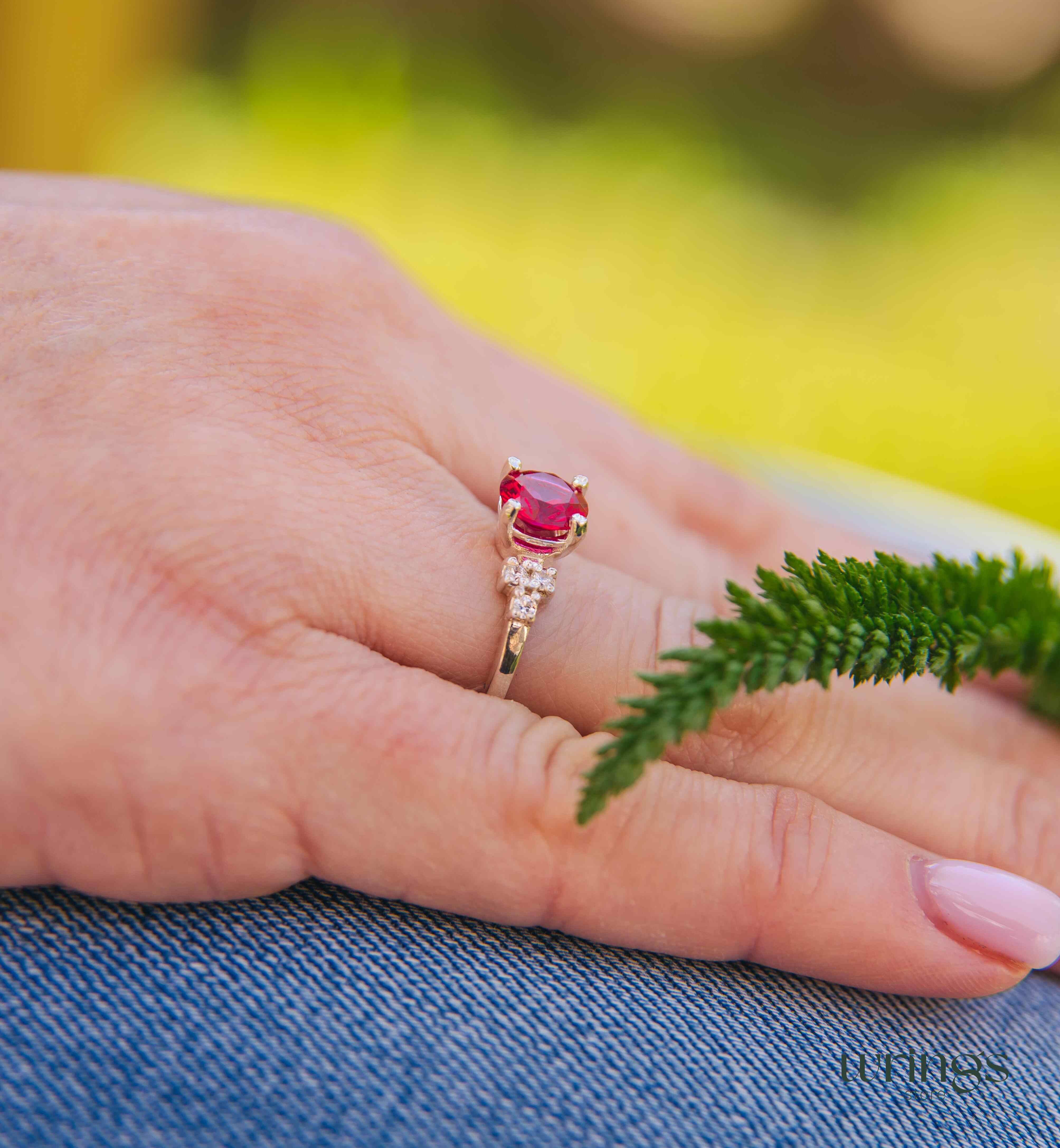 Large Simulated Ruby Engagement Ring Cluster Side Stones
