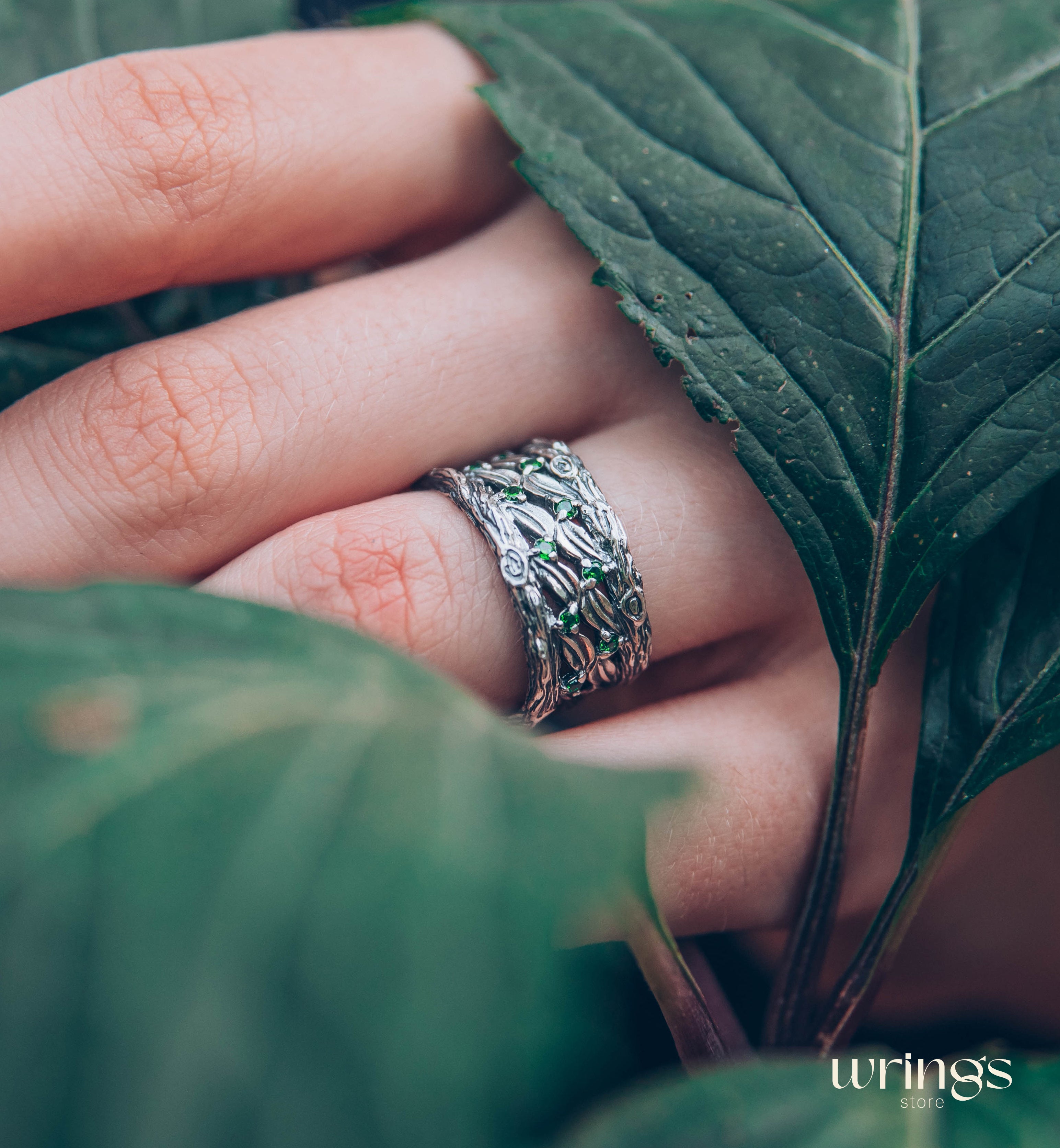Silver Leaves and Branch Statement Wedding Band with Emeralds