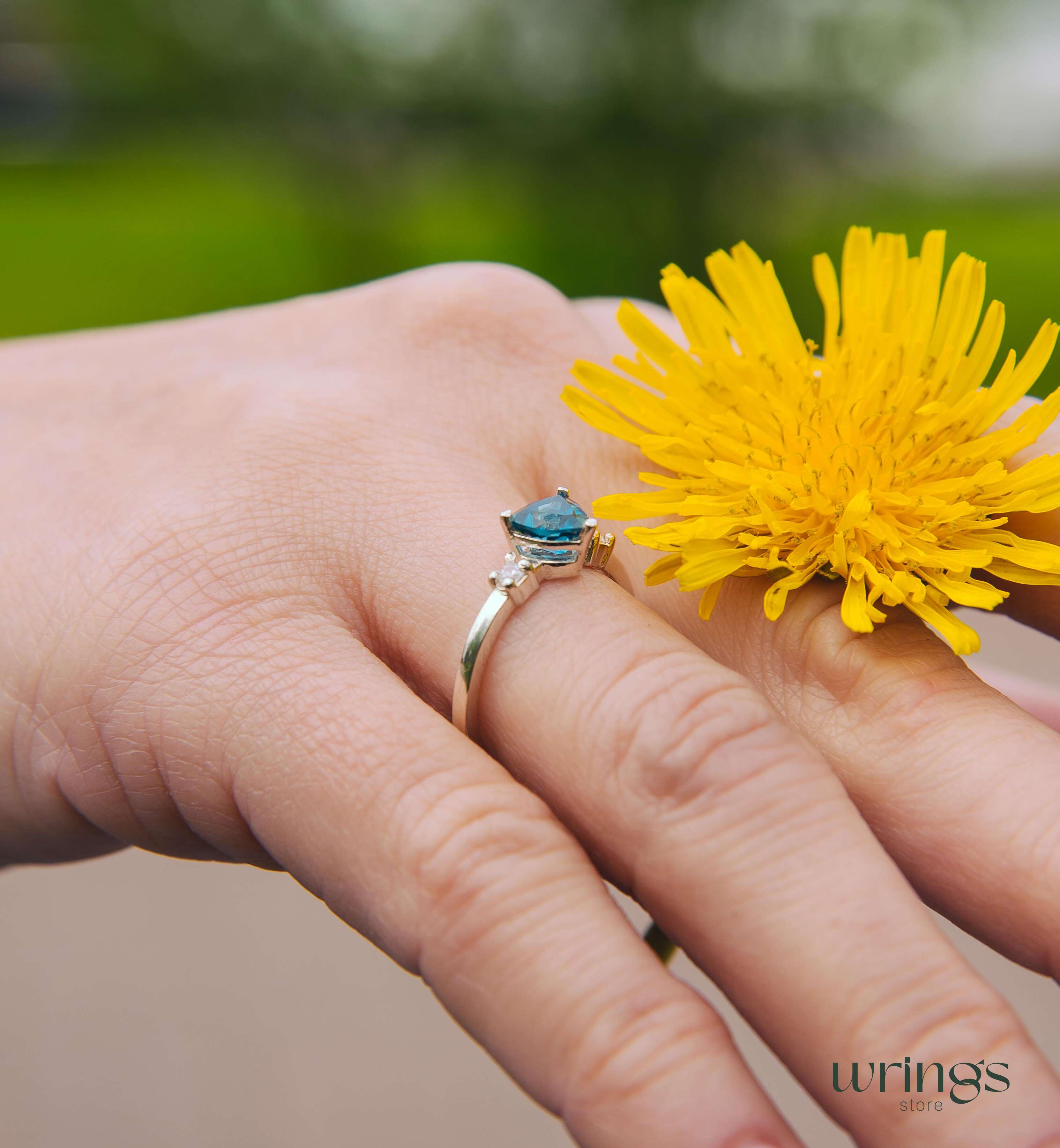 Large Trillion Blue Topaz Three Stone Engagement Ring