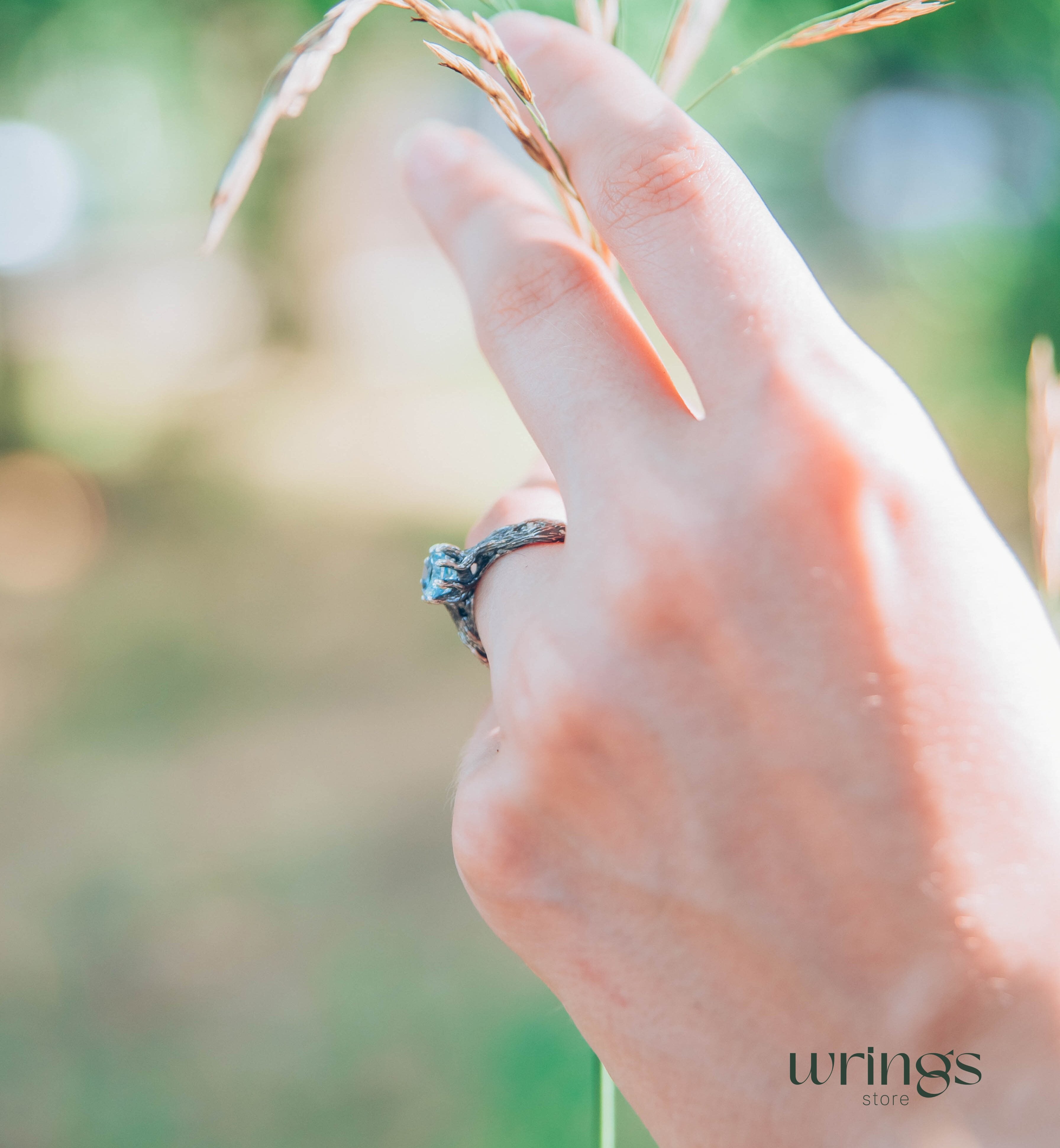 Vivid Topaz Engagement Ring with Silver Branch