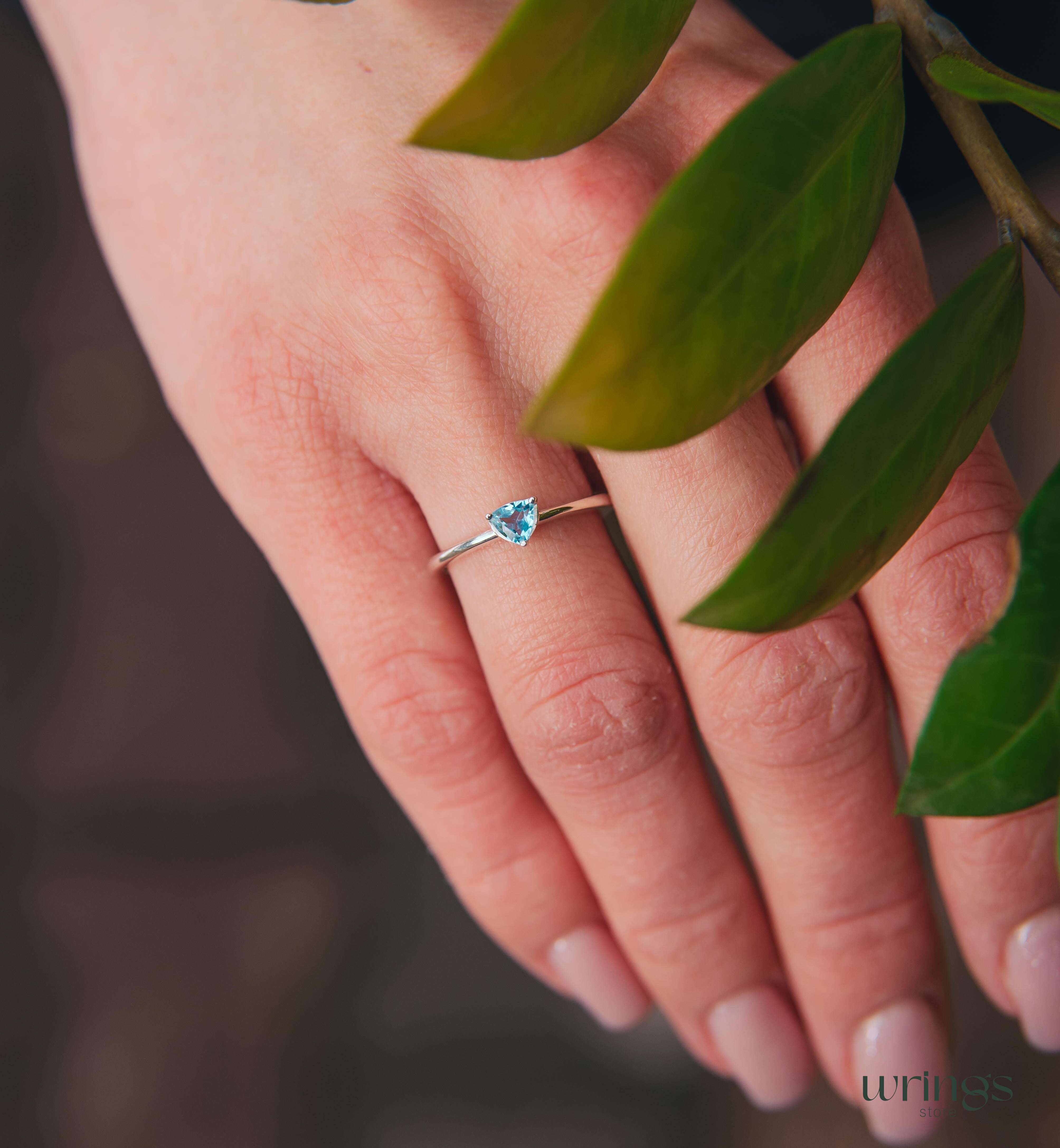 Blue Swiss Topaz Trillion Solitaire Ring in Silver