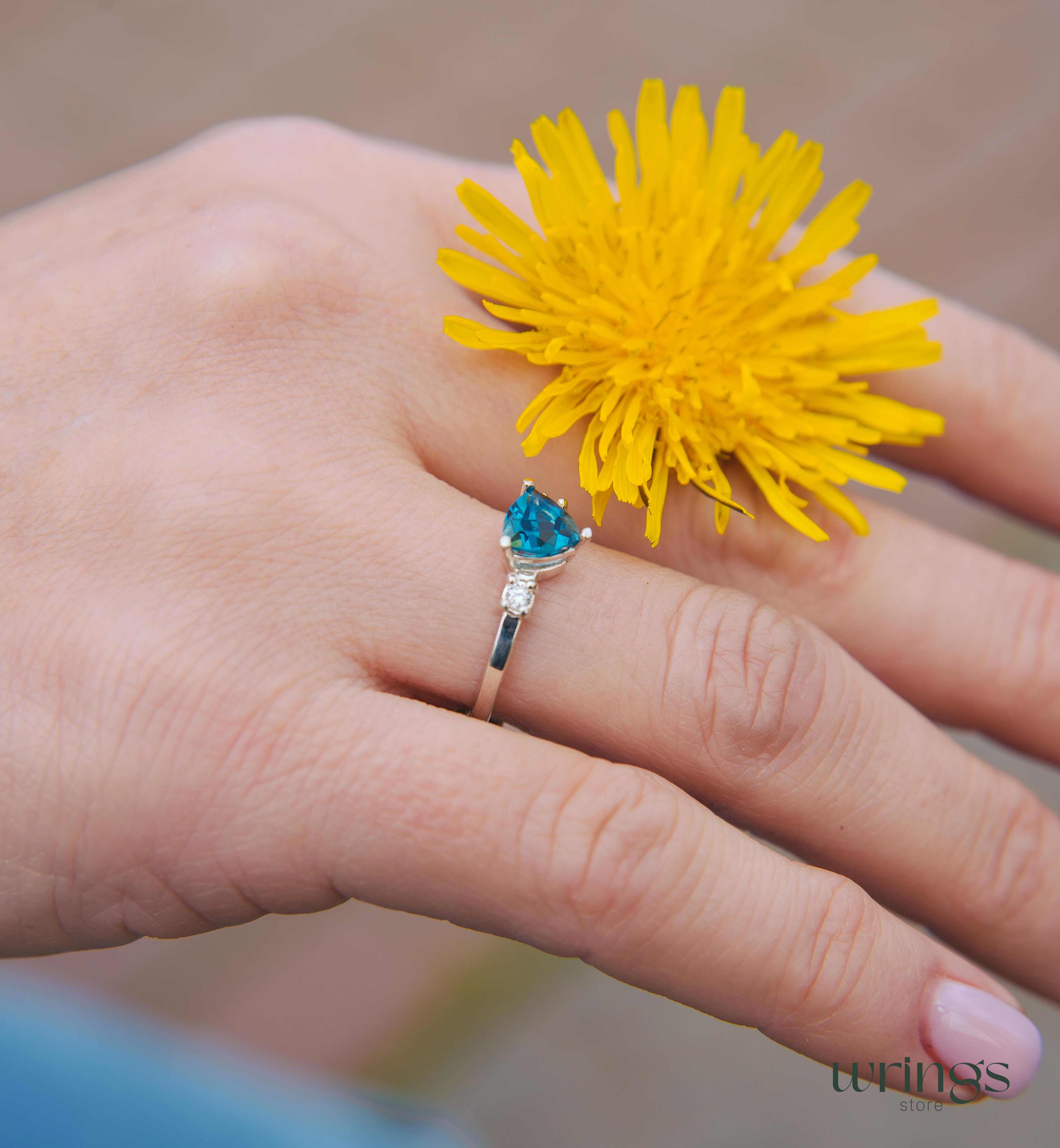 Large Trillion Blue Topaz Three Stone Engagement Ring