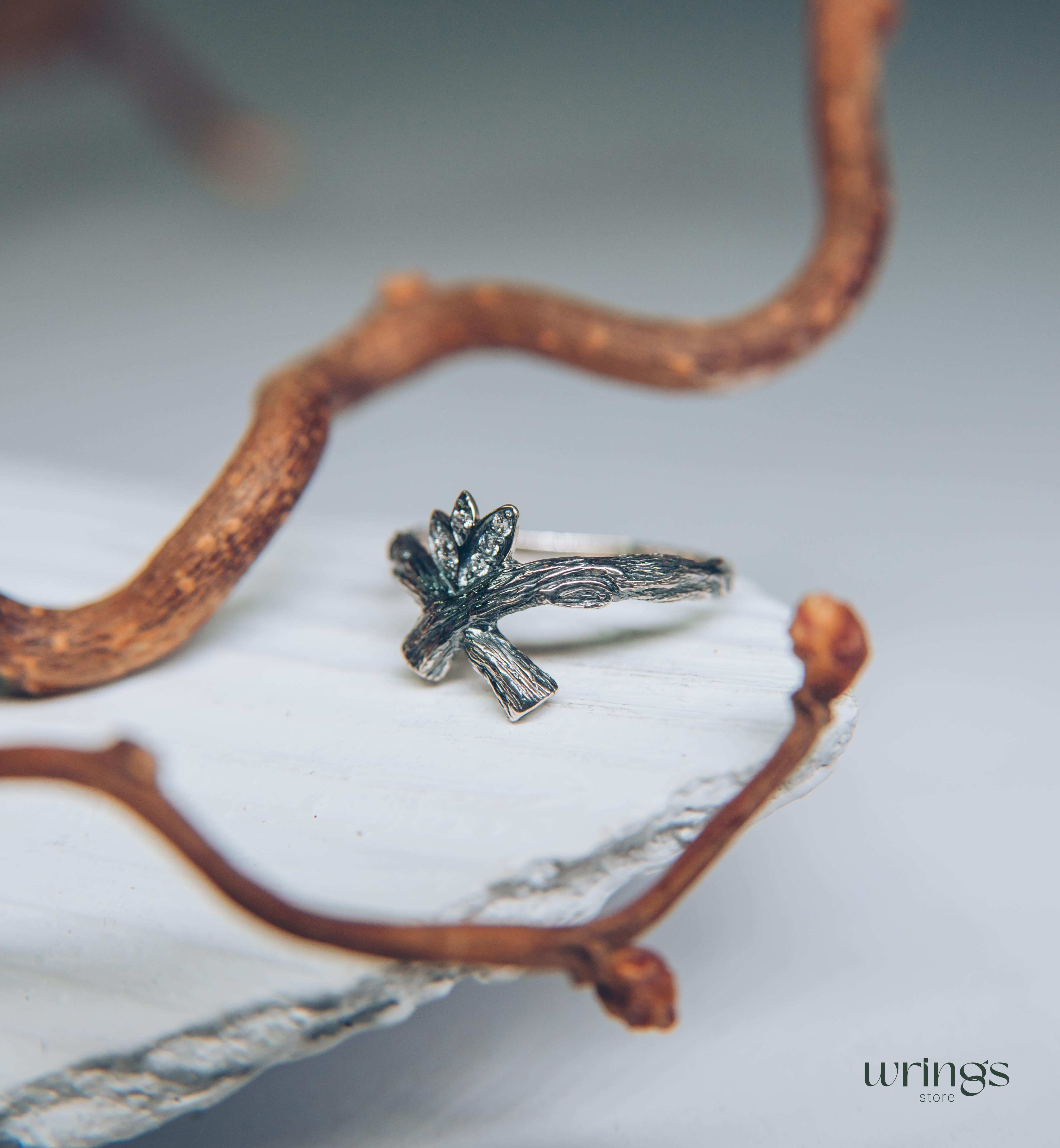 Crossed Silver Twig Ring with CZ in Leaves